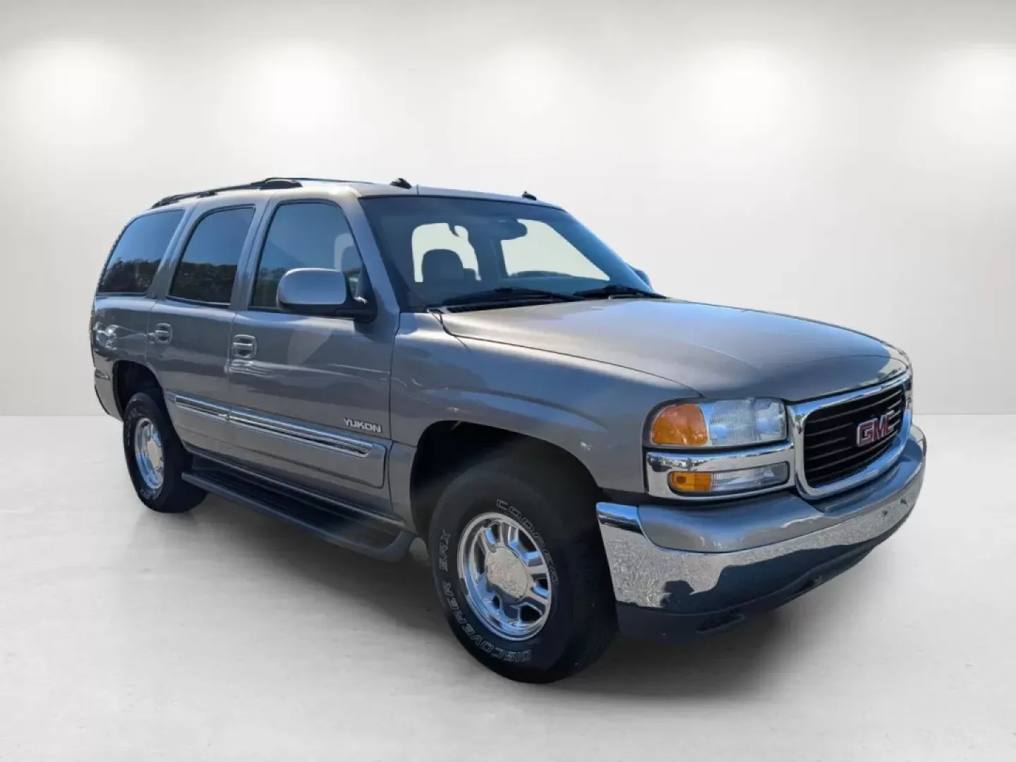 2003 /Pewter/Dark Pewter GMC Yukon SLT (1GKEC13Z83J) with an Other engine, located at 1430 Gateway Drive, Opelika, AL, 36801, (334) 239-0944, 32.637871, -85.409790 - **Discover Adventure and Comfort with the 2003 GMC Yukon SLT at Gils Auto - Phenix City**<br /> <br /> If you're on the hunt for a reliable SUV that embodies comfort and versatility, look no further than the 2003 GMC Yukon SLT, available now at Gils Auto in Phenix City, AL. This robust vehicle offer - Photo#2