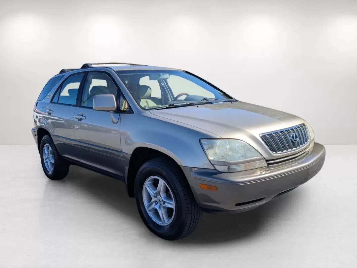 2003 Lexus RX 300 (JTJGF10U330) with an Other engine, located at 1430 Gateway Drive, Opelika, AL, 36801, (334) 239-0944, 32.637871, -85.409790 - **Explore the 2003 Lexus RX 300: Your Perfect Companion for Family Adventures and Daily Commutes!**<br /> <br /> Are you seeking a reliable vehicle that caters to your family's needs while ensuring comfort and style? Look no further! This 2003 Lexus RX 300, available at **Gils Auto** in **Phenix Cit - Photo#2