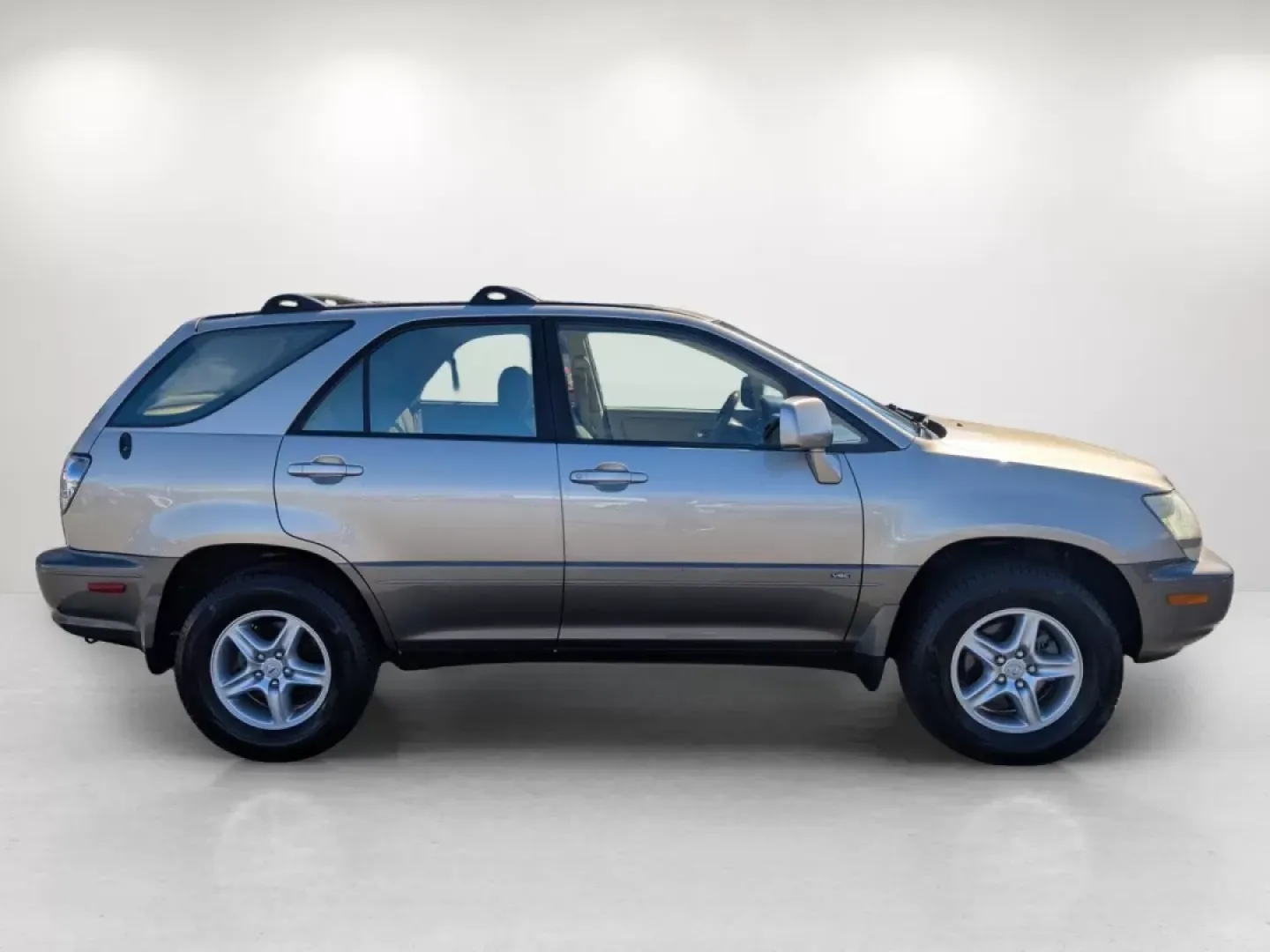 2003 Lexus RX 300 (JTJGF10U330) with an Other engine, located at 1430 Gateway Drive, Opelika, AL, 36801, (334) 239-0944, 32.637871, -85.409790 - **Explore the 2003 Lexus RX 300: Your Perfect Companion for Family Adventures and Daily Commutes!**<br /> <br /> Are you seeking a reliable vehicle that caters to your family's needs while ensuring comfort and style? Look no further! This 2003 Lexus RX 300, available at **Gils Auto** in **Phenix Cit - Photo#3