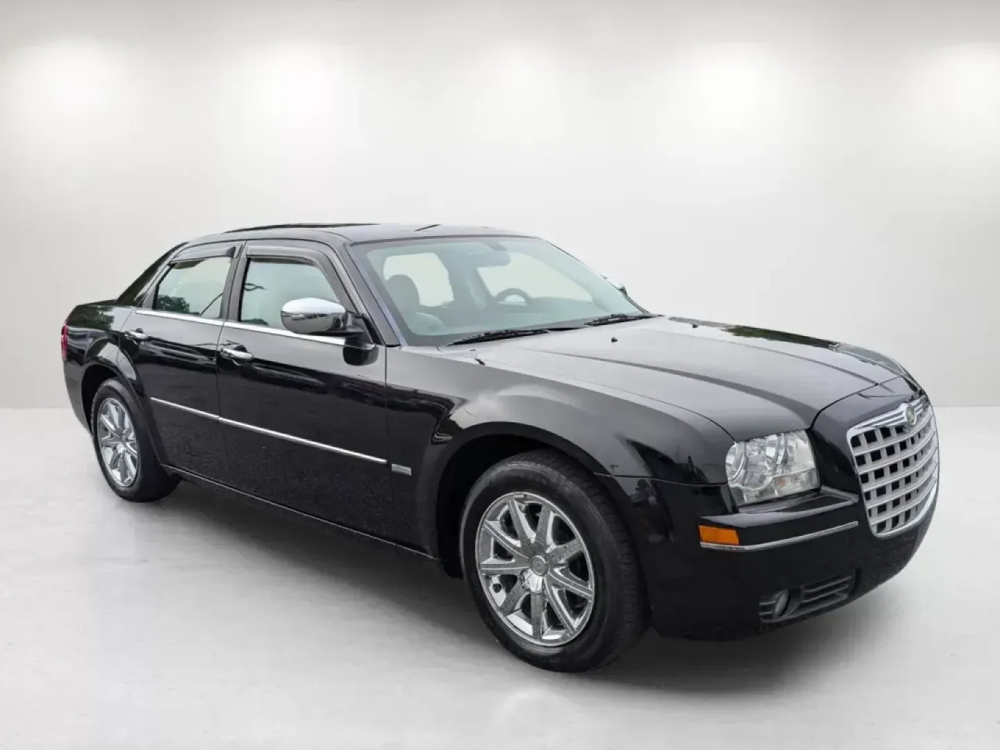 2010 /Dark Khaki/Light Gray Stone Chrysler 300 Touring Signature (2C3CA5CV4AH) with an Other engine, located at 1430 Gateway Drive, Opelika, AL, 36801, (334) 239-0944, 32.637871, -85.409790 - **Drive in Style with the 2010 Chrysler 300 Touring Signature Perfect for Daily Commutes or Weekend Getaways!**<br /> <br /> Are you on the hunt for a vehicle that combines sophistication, comfort, and reliability? Look no further than the stunning 2010 Chrysler 300 Touring Signature, now available - Photo#2