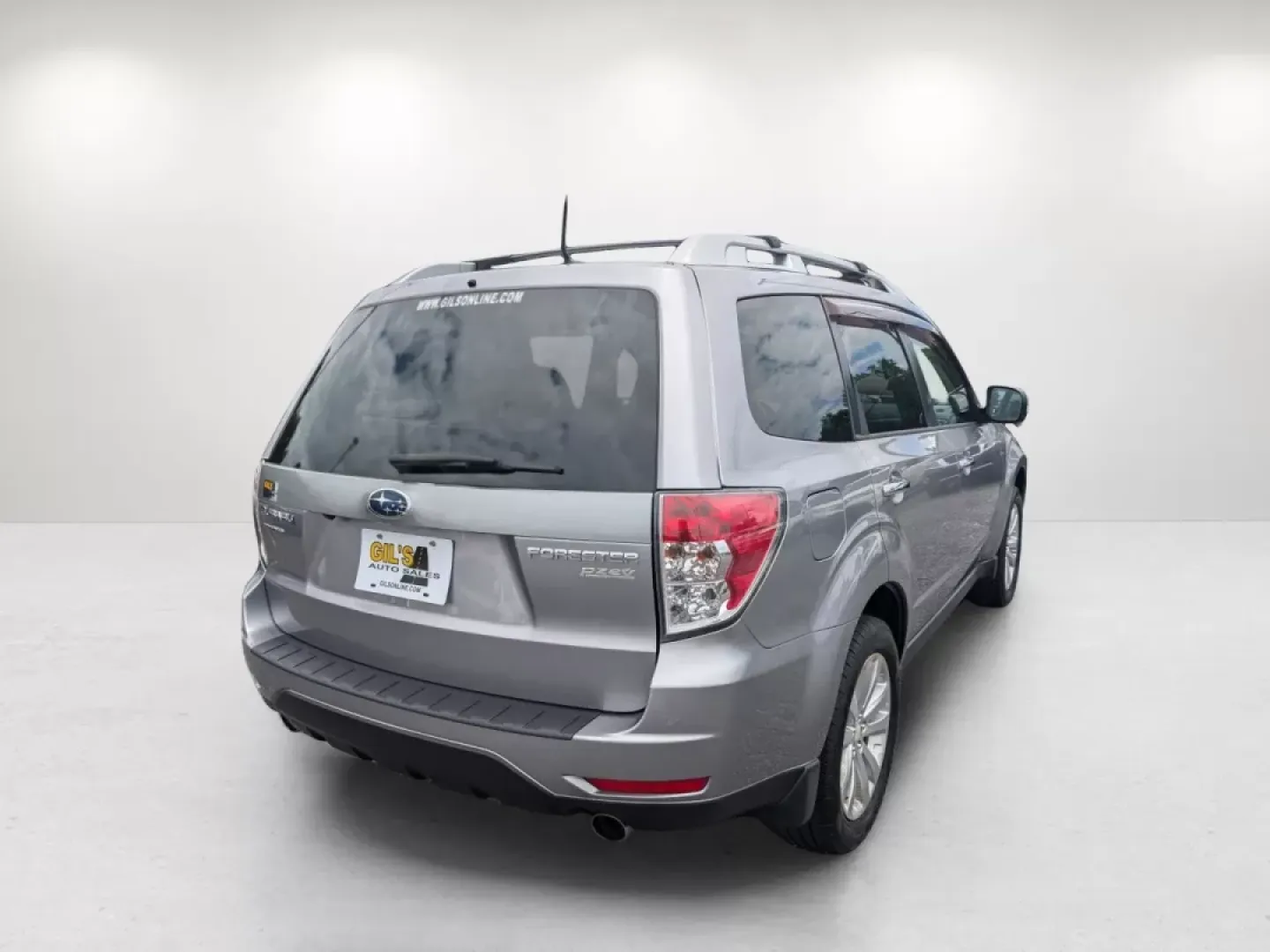 2011 /Platinum Subaru Forester 2.5X Touring (JF2SHAGC8BH) with an Other engine, located at 7000 Northlake Connector, Columbus, GA, 31904, (706) 987-8085, 32.524975, -84.978134 - **Explore Adventure with the 2011 Subaru Forester at Gils Auto!**<br /> <br /> Are you ready to elevate your lifestyle and take every road trip to the next level? The 2011 Subaru Forester, available now at Gils Auto in Phenix City, AL, is the ideal SUV for families, commuters, and adventurous spirit - Photo#4