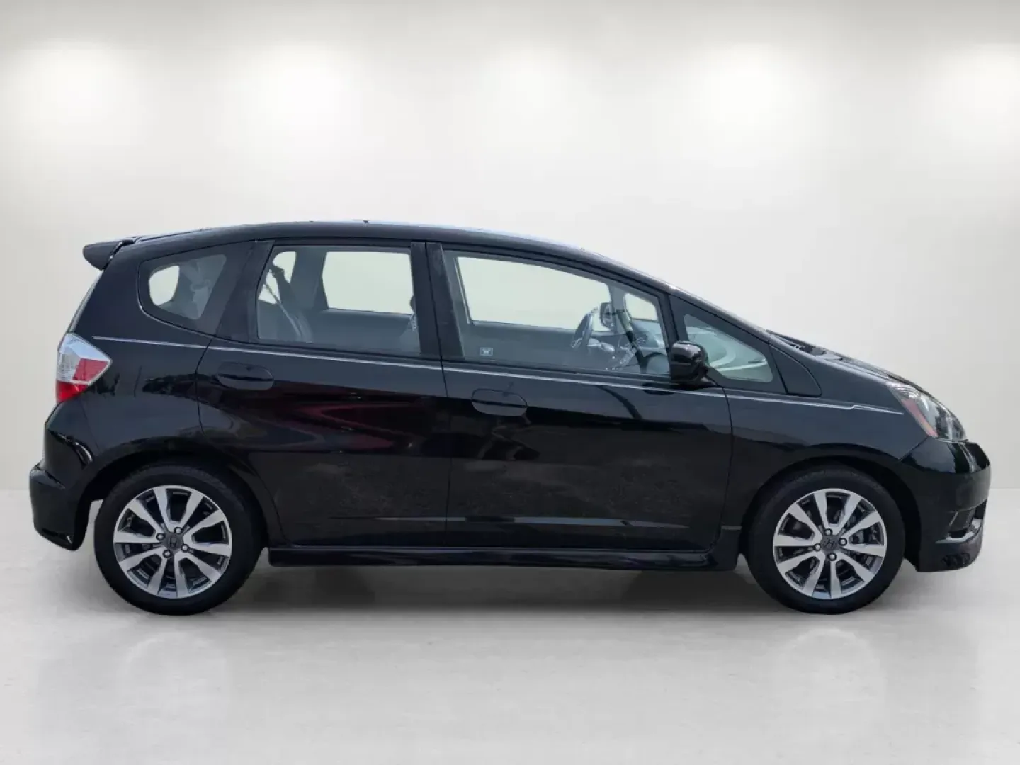 2012 Honda Fit Sport (JHMGE8H57CC) with an Other engine, located at 7000 Northlake Connector, Columbus, GA, 31904, (706) 987-8085, 32.524975, -84.978134 - Are you ready to elevate your daily commute or weekend adventures? The 2012 Honda Fit Sport, available at Gils Auto - Columbus #2, is the perfect blend of efficiency, style, and versatility, making it an ideal choice for budget-conscious buyers and families alike. This compact hatchback is designed - Photo#3