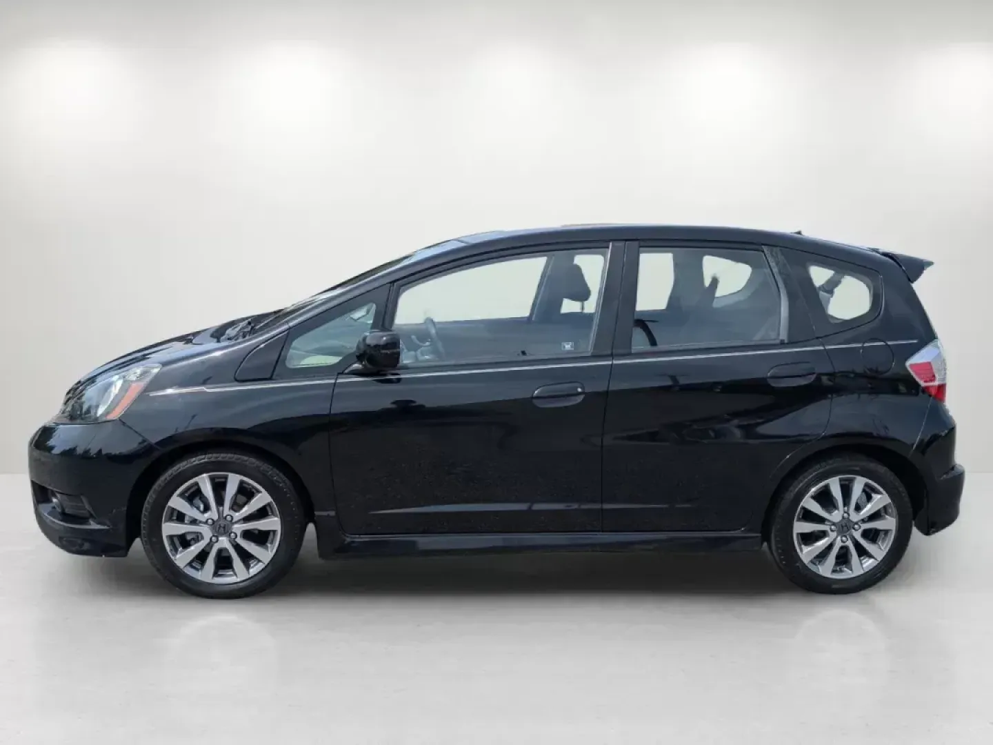 2012 Honda Fit Sport (JHMGE8H57CC) with an Other engine, located at 7000 Northlake Connector, Columbus, GA, 31904, (706) 987-8085, 32.524975, -84.978134 - Are you ready to elevate your daily commute or weekend adventures? The 2012 Honda Fit Sport, available at Gils Auto - Columbus #2, is the perfect blend of efficiency, style, and versatility, making it an ideal choice for budget-conscious buyers and families alike. This compact hatchback is designed - Photo#7