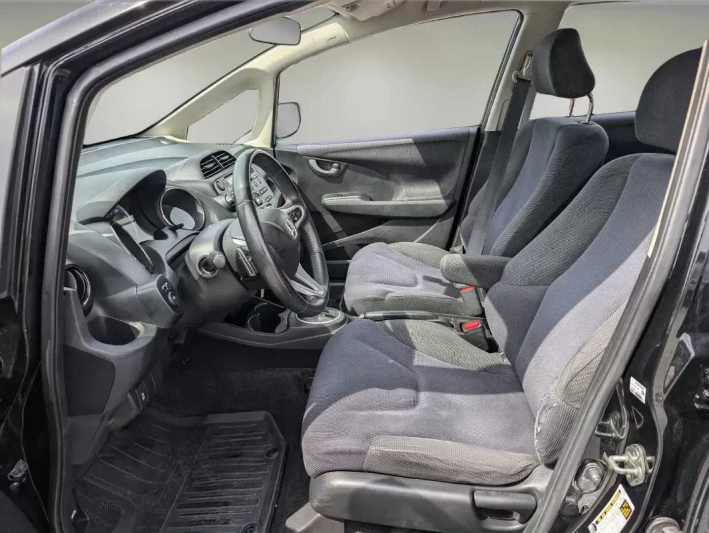 2012 Honda Fit Sport (JHMGE8H57CC) with an Other engine, located at 7000 Northlake Connector, Columbus, GA, 31904, (706) 987-8085, 32.524975, -84.978134 - Are you ready to elevate your daily commute or weekend adventures? The 2012 Honda Fit Sport, available at Gils Auto - Columbus #2, is the perfect blend of efficiency, style, and versatility, making it an ideal choice for budget-conscious buyers and families alike. This compact hatchback is designed - Photo#9