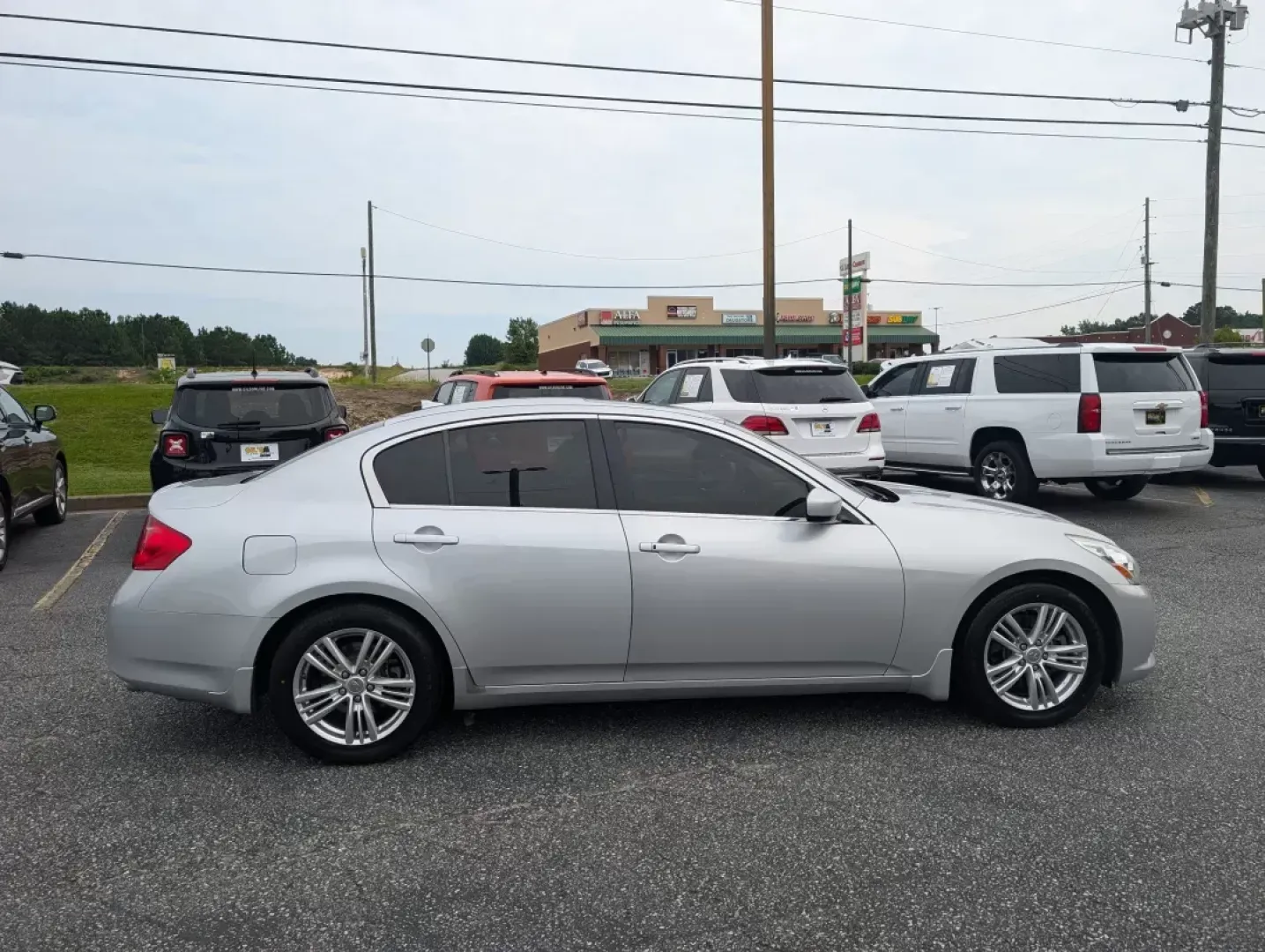 2012 /Graphite Infiniti G37 Sedan Journey (JN1CV6AP9CM) with an Other engine, located at 3959 U.S. 80 W, Phenix City, AL, 36870, (334) 297-4885, 32.469296, -85.135185 - **Elevate Your Daily Drive with the 2012 Infiniti G37 Sedan at Gils Auto!**<br /> <br /> Are you ready to upgrade your commuting experience or make weekend getaways unforgettable? Look no further than this stunning 2012 Infiniti G37 Sedan, available now at Gils Auto in Phenix City, AL. Located conve - Photo#3