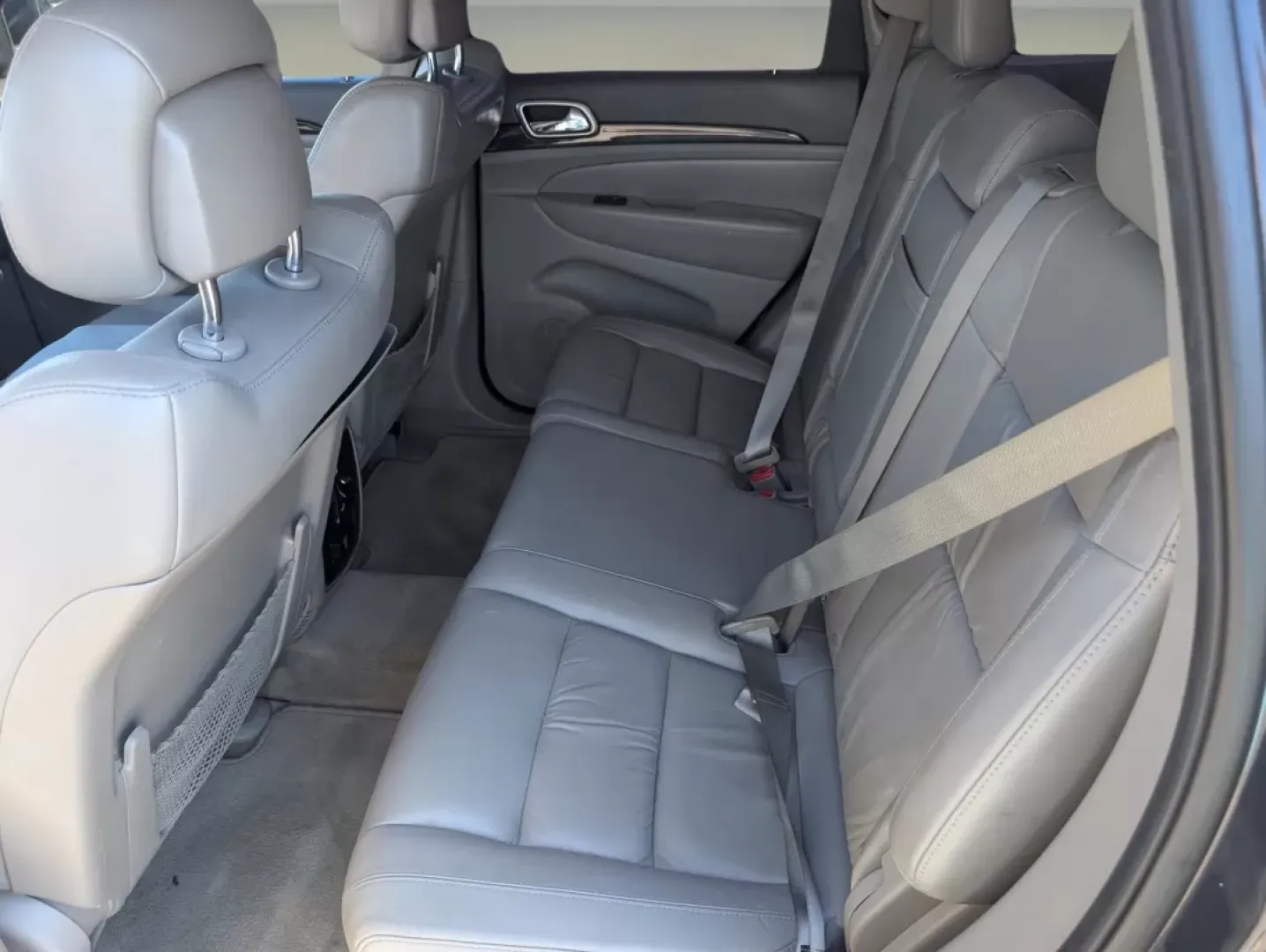 2012 /Dark Graystone/Medium Graystone Jeep Grand Cherokee Laredo Altitude (1C4RJEAG0CC) with an Other engine, located at 1430 Gateway Drive, Opelika, AL, 36801, (334) 239-0944, 32.637871, -85.409790 - **Unleash Your Adventurous Spirit with the 2012 Jeep Grand Cherokee Laredo Altitude!**<br /> <br /> Are you looking for the perfect vehicle to elevate your lifestyle? Whether it's weekend getaways, daily commutes, or family road trips, the 2012 Jeep Grand Cherokee Laredo Altitude is designed to meet - Photo#12