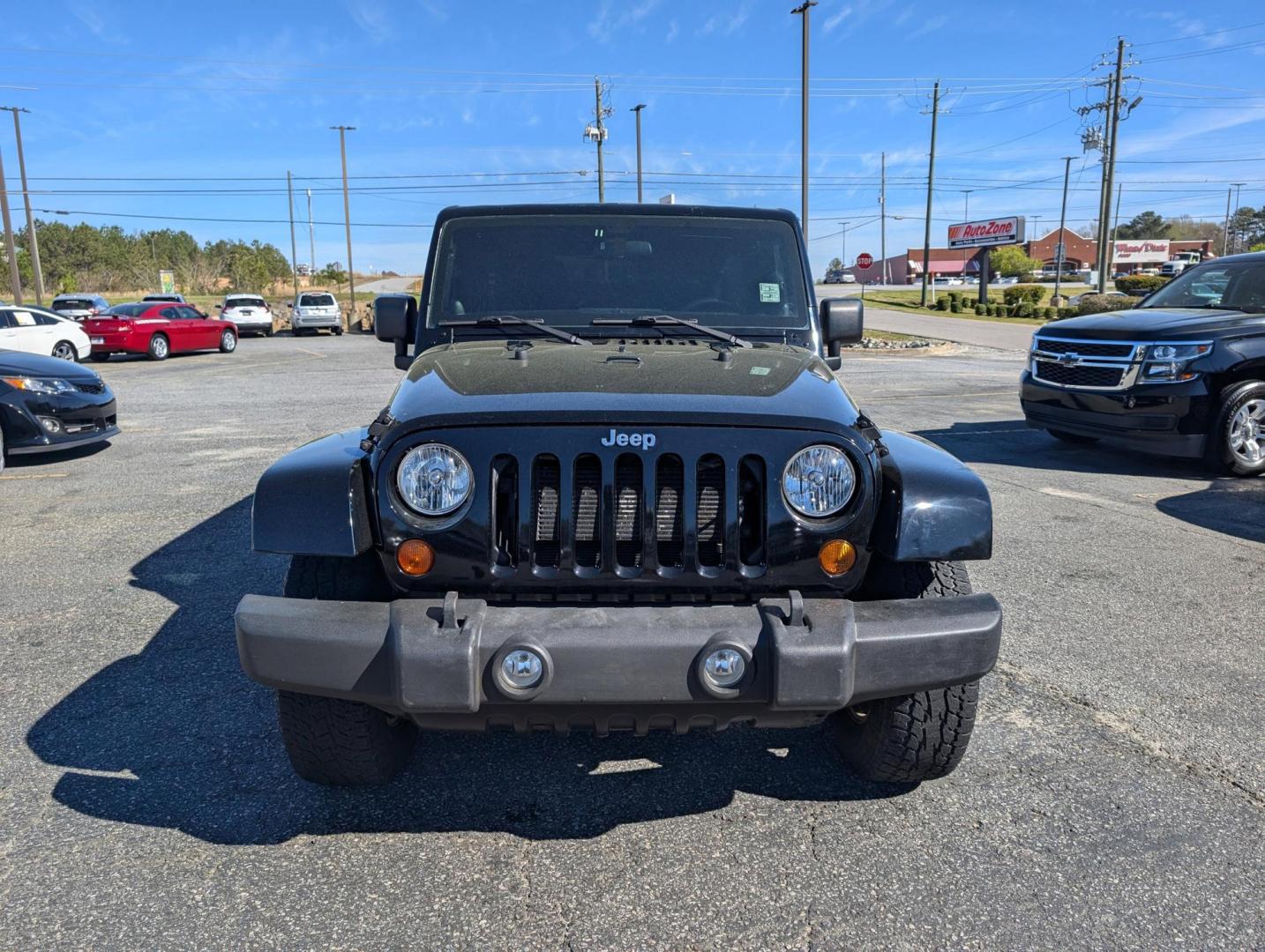 2012 Black /Black Interior Jeep Wrangler Unlimited Sahara (1C4BJWEG5CL) with an Gas V6 3.6L/220 engine, 5-Speed Automatic transmission, located at 521 Old Farm Lane Rd, Prattville, AL, 36066, (334) 325-1505, 32.482460, -86.416367 - 2012 Jeep Wrangler Unlimited Sahara - Photo#1