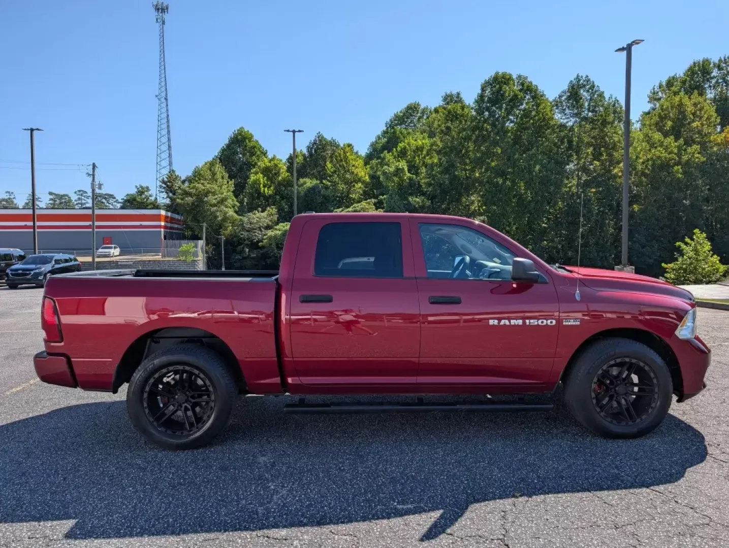 2012 /Dark Slate/Medium Graystone Ram 1500 Express (1C6RD6KT9CS) with an Other engine, located at 3959 U.S. 80 W, Phenix City, AL, 36870, (334) 297-4885, 32.469296, -85.135185 - **Drive Your Adventures with Confidence in this 2012 Ram 1500 Express Crew Cab!**<br /> <br /> Are you ready to elevate your weekend adventures or tackle your daily commute with style and power? At Gils Auto in Phenix City, AL, we have just the vehicle for you! This striking Deep Cherry Red Crystal - Photo#3
