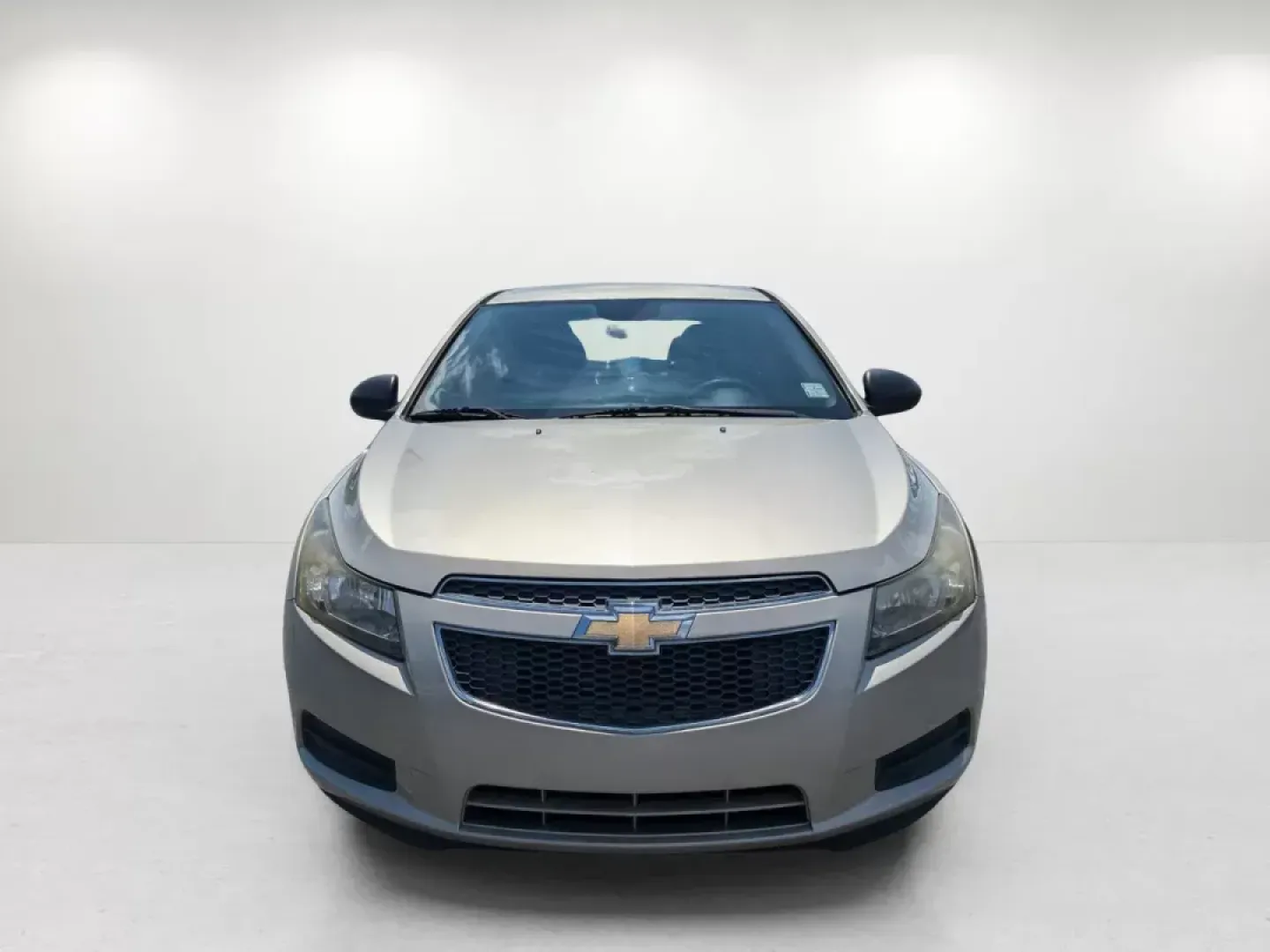 2013 Champagne Silver Metallic /Jet Black/Medium Titanium Chevrolet Cruze LS (1G1PA5SH9D7) with an Other engine, located at 7000 Northlake Connector, Columbus, GA, 31904, (706) 987-8085, 32.524975, -84.978134 - **Discover Your Perfect Daily Driver at Gils Auto in Phenix City!**<br /> <br /> Are you on the hunt for a reliable, fuel-efficient sedan that fits seamlessly into your busy lifestyle? Look no further! The 2013 Chevrolet Cruze LS is the ideal choice for those who value comfort, affordability, and st - Photo#1