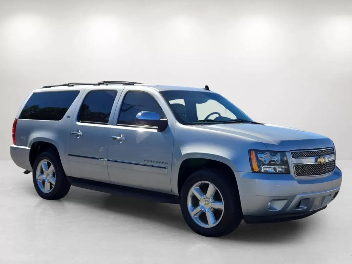 2013 /Light Titanium/Dark Titanium Chevrolet Suburban LTZ (1GNSCKE02DR) with an Other engine, located at 804 22nd Ave, Phenix City, AL, 36870, (334) 297-1860, 32.484749, -85.024475 - Step into a world of adventure and family bonding with this 2013 Chevrolet Suburban LTZ, available now at Gils Auto in Phenix City, AL. Ideal for growing families or anyone who loves the open road, this spacious SUV combines luxury, comfort, and versatility for those seeking a reliable vehicle for e - Photo#3