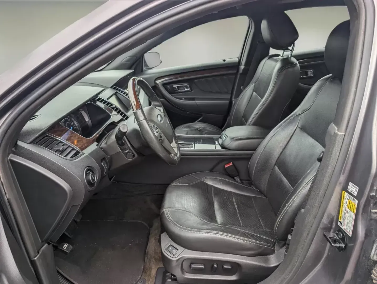 2013 Ford Taurus Limited (1FAHP2F86DG) with an Other engine, located at 3959 U.S. 80 W, Phenix City, AL, 36870, (334) 297-4885, 32.469296, -85.135185 - Are you in search of a vehicle that seamlessly fits into your daily life while providing the comfort and reliability needed for all your adventures? Look no further than this stunning 2013 Ford Taurus Limited, now available at Gils Auto in Phenix City, AL. This sedan is perfect for both growing fami - Photo#9