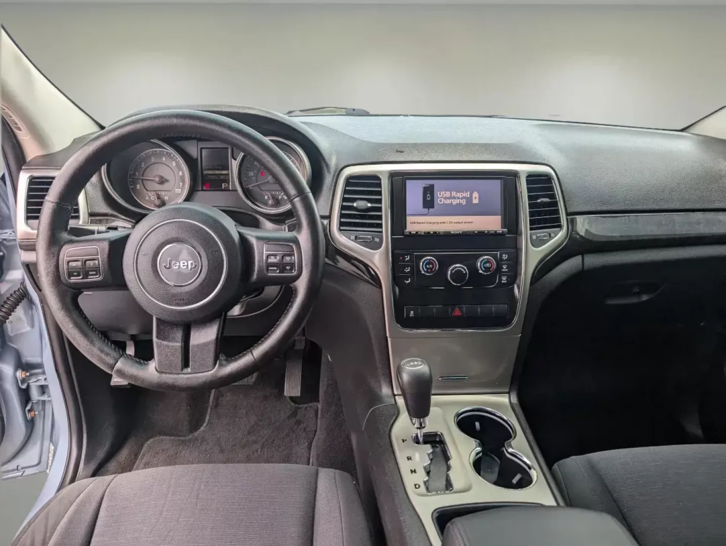 2013 /Black Jeep Grand Cherokee Laredo (1C4RJEAG2DC) with an Gas/Ethanol V6 3.6L/220 engine, 5-Speed Automatic transmission, located at 5115 14th Ave., Columbus, GA, 31904, (706) 323-0345, 32.511494, -84.971046 - **Unleash Your Adventurous Spirit with the 2013 Jeep Grand Cherokee Laredo Ideal for Family Road Trips and Daily Commutes!**<br /> <br /> Are you dreaming of weekend getaways or a reliable companion for your daily commute? Look no further than the 2013 Jeep Grand Cherokee Laredo, now available at G - Photo#11