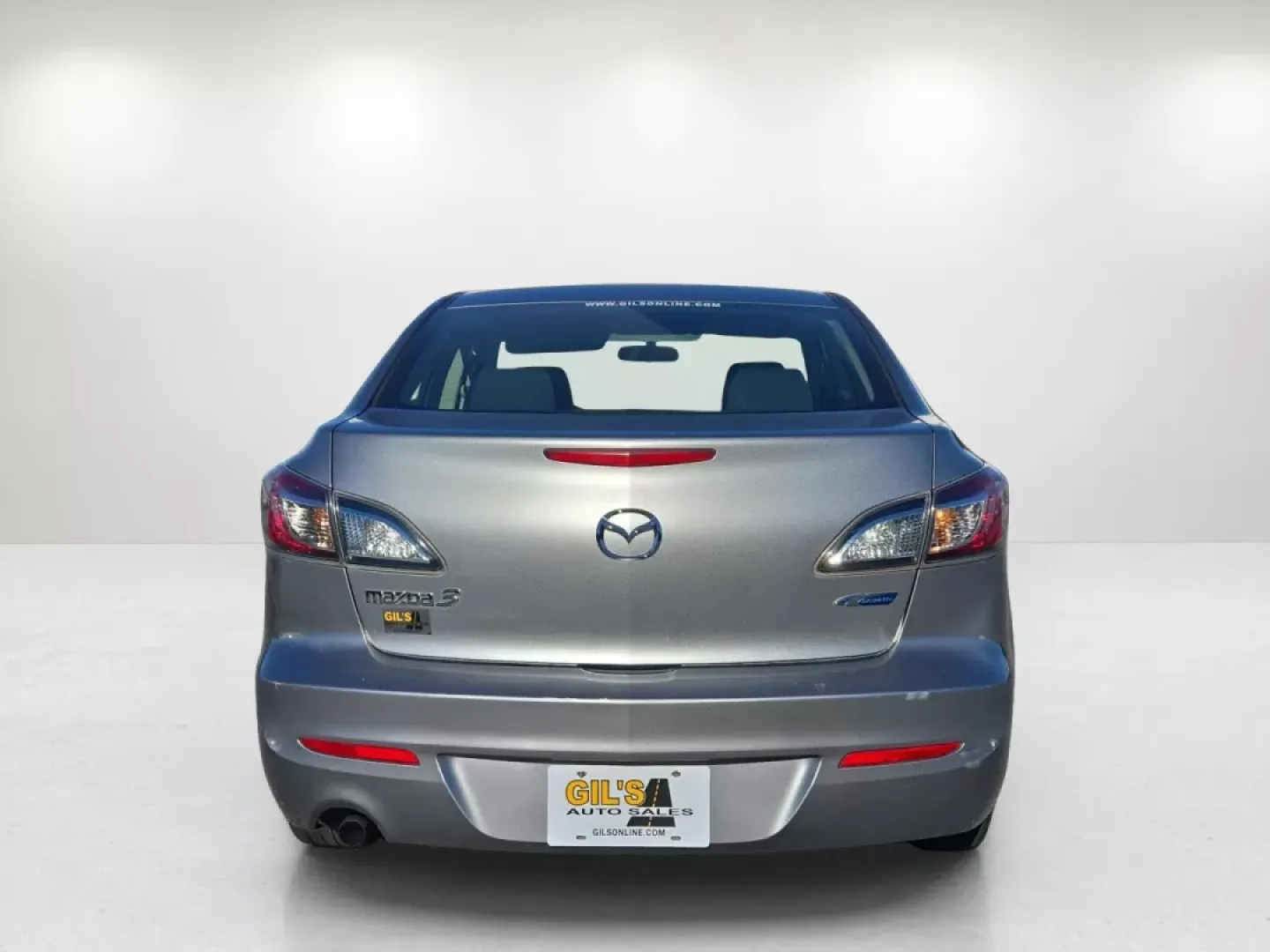 2013 Mazda Mazda3 i Sport (JM1BL1U79D1) with an Other engine, located at 1430 Gateway Drive, Opelika, AL, 36801, (334) 239-0944, 32.637871, -85.409790 - **Discover Your Next Adventure with the 2013 Mazda3 i Sport at Gils Auto!**<br /> <br /> Are you ready to elevate your daily commute or embark on weekend adventures? Look no further than this 2013 Mazda3 i Sport, available now at Gils Auto in Phenix City, AL. Designed for budget-conscious buyers, th - Photo#6