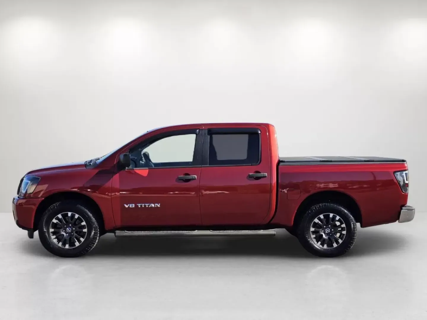 2013 /Charcoal Nissan Titan S (1N6BA0EK2DN) with an Other engine, located at 521 Old Farm Lane Rd, Prattville, AL, 36066, (334) 325-1505, 32.482460, -86.416367 - Are you in search of a versatile pickup that can handle your family's needs while also serving as your weekend warrior? Look no further than this stunning 2013 Nissan Titan S, available now at Gils Auto - Prattville. This crew cab pickup, with its striking Cayenne Red exterior and comfortable charco - Photo#8