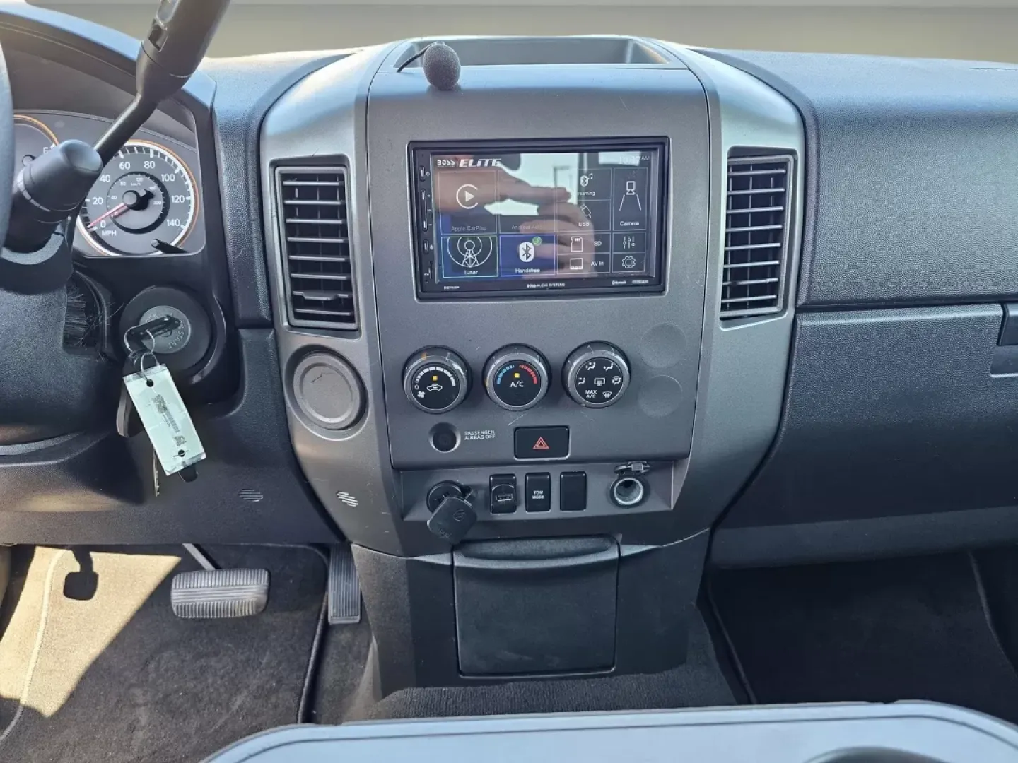 2013 /Charcoal Nissan Titan S (1N6BA0EK2DN) with an Other engine, located at 521 Old Farm Lane Rd, Prattville, AL, 36066, (334) 325-1505, 32.482460, -86.416367 - Are you in search of a versatile pickup that can handle your family's needs while also serving as your weekend warrior? Look no further than this stunning 2013 Nissan Titan S, available now at Gils Auto - Prattville. This crew cab pickup, with its striking Cayenne Red exterior and comfortable charco - Photo#13