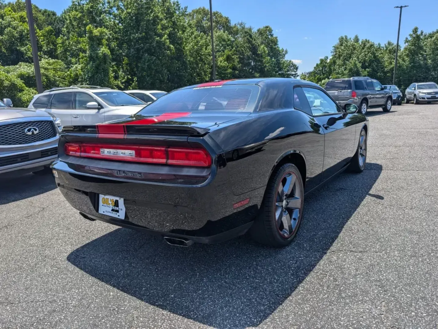 2014 /Radar Red/Dk Slate Gray Dodge Challenger Rallye Redline (2C3CDYAG4EH) with an Other engine, located at 3959 U.S. 80 W, Phenix City, AL, 36870, (334) 297-4885, 32.469296, -85.135185 - **Get Ready to Ignite Your Passion for Driving with This 2014 Dodge Challenger!**<br /> <br /> Are you ready to take your driving experience to a whole new level? If you're searching for a powerful yet stylish coupe that makes every journey feel like an adventure, look no further than this striking - Photo#4
