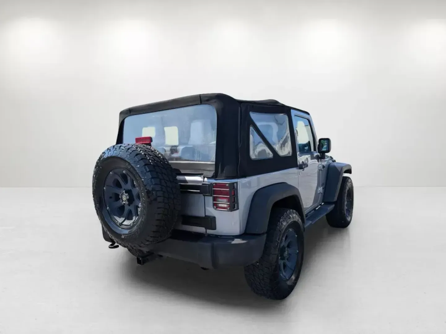 2014 /Black Jeep Wrangler Sport (1C4AJWAG7EL) with an Regular Unleaded V-6 3.6 L/220 engine, 5-Speed Automatic w/OD transmission, located at 1430 Gateway Drive, Opelika, AL, 36801, (334) 239-0944, 32.637871, -85.409790 - 2014 Jeep Wrangler Sport - Photo#4