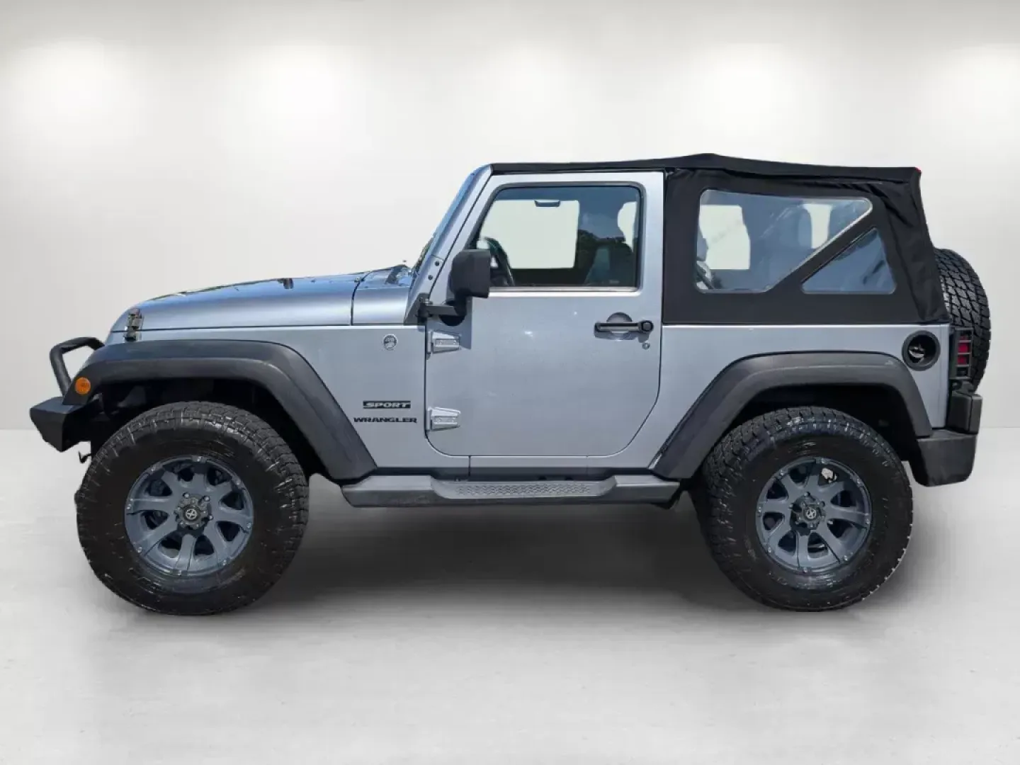 2014 /Black Jeep Wrangler Sport (1C4AJWAG7EL) with an Regular Unleaded V-6 3.6 L/220 engine, 5-Speed Automatic w/OD transmission, located at 1430 Gateway Drive, Opelika, AL, 36801, (334) 239-0944, 32.637871, -85.409790 - 2014 Jeep Wrangler Sport - Photo#7