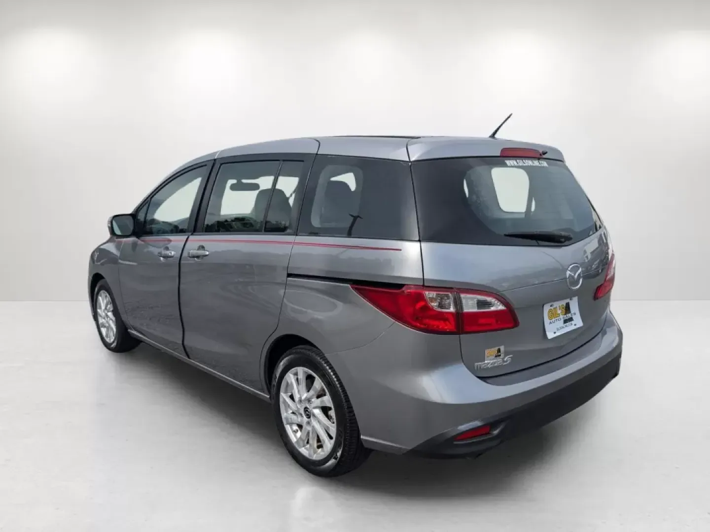 2014 /Black Mazda Mazda5 Sport (JM1CW2BL8E0) with an Other engine, located at 804 22nd Ave, Phenix City, AL, 36870, (334) 297-1860, 32.484749, -85.024475 - **Experience Versatility with the 2014 Mazda5 Sport at Gils Auto - Columbus #2!**<br /> <br /> Are you ready to elevate your lifestyle with a vehicle that adapts to your family's needs, weekend adventures, and daily commutes? Look no further! The 2014 Mazda5 Sport is your perfect companion for life - Photo#6