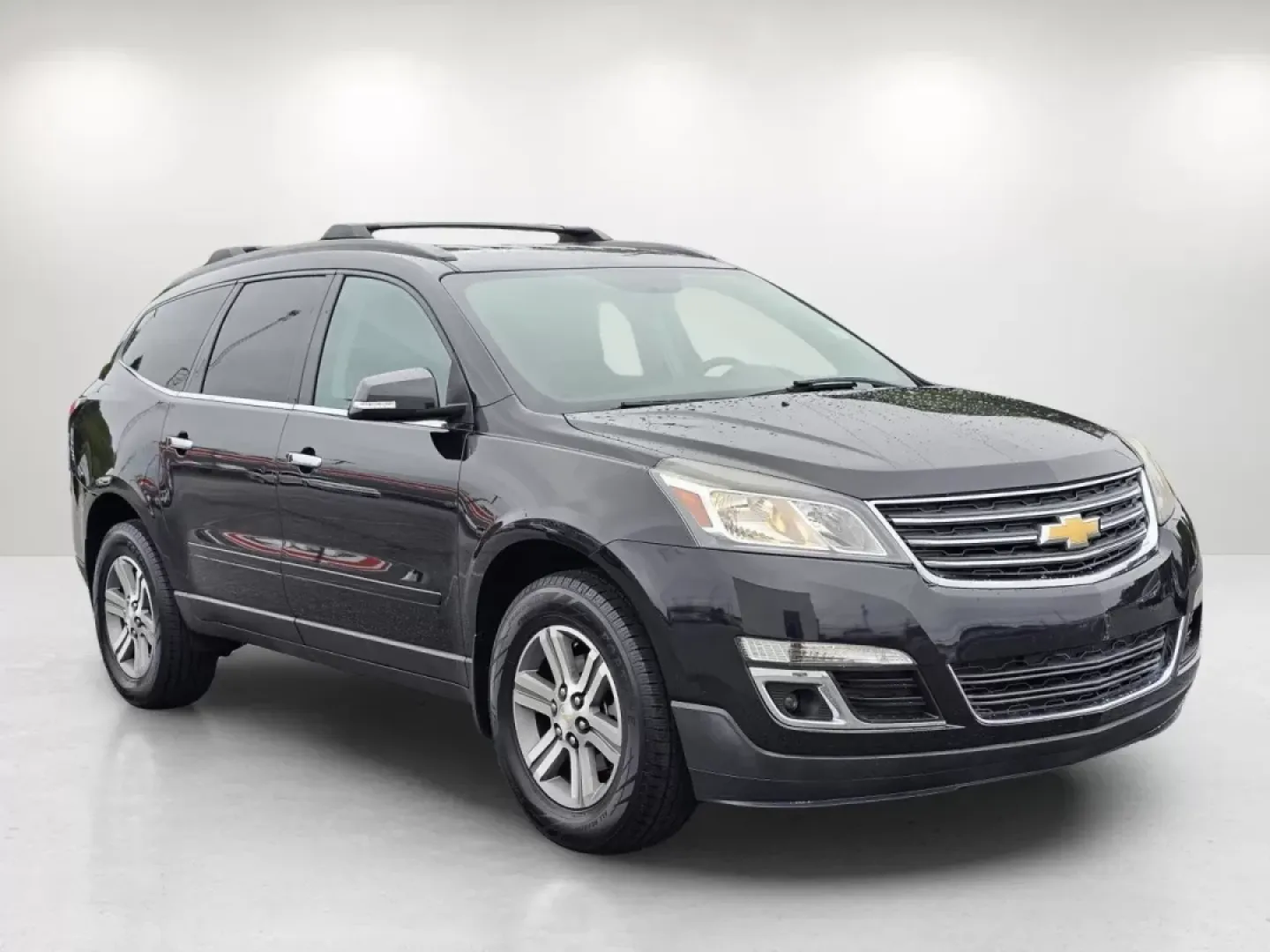 2015 /Ebony Chevrolet Traverse LT (1GNKRHKDXFJ) with an Other engine, located at 5115 14th Ave., Columbus, GA, 31904, (706) 323-0345, 32.511494, -84.971046 - **Elevate Your Family Adventures with the 2015 Chevrolet Traverse LT at Gils Auto!**<br /> <br /> Are you searching for the perfect family SUV that combines space, comfort, and the latest technology? Look no further than this 2015 Chevrolet Traverse LT, now available at Gils Auto in Phenix City, AL. - Photo#3