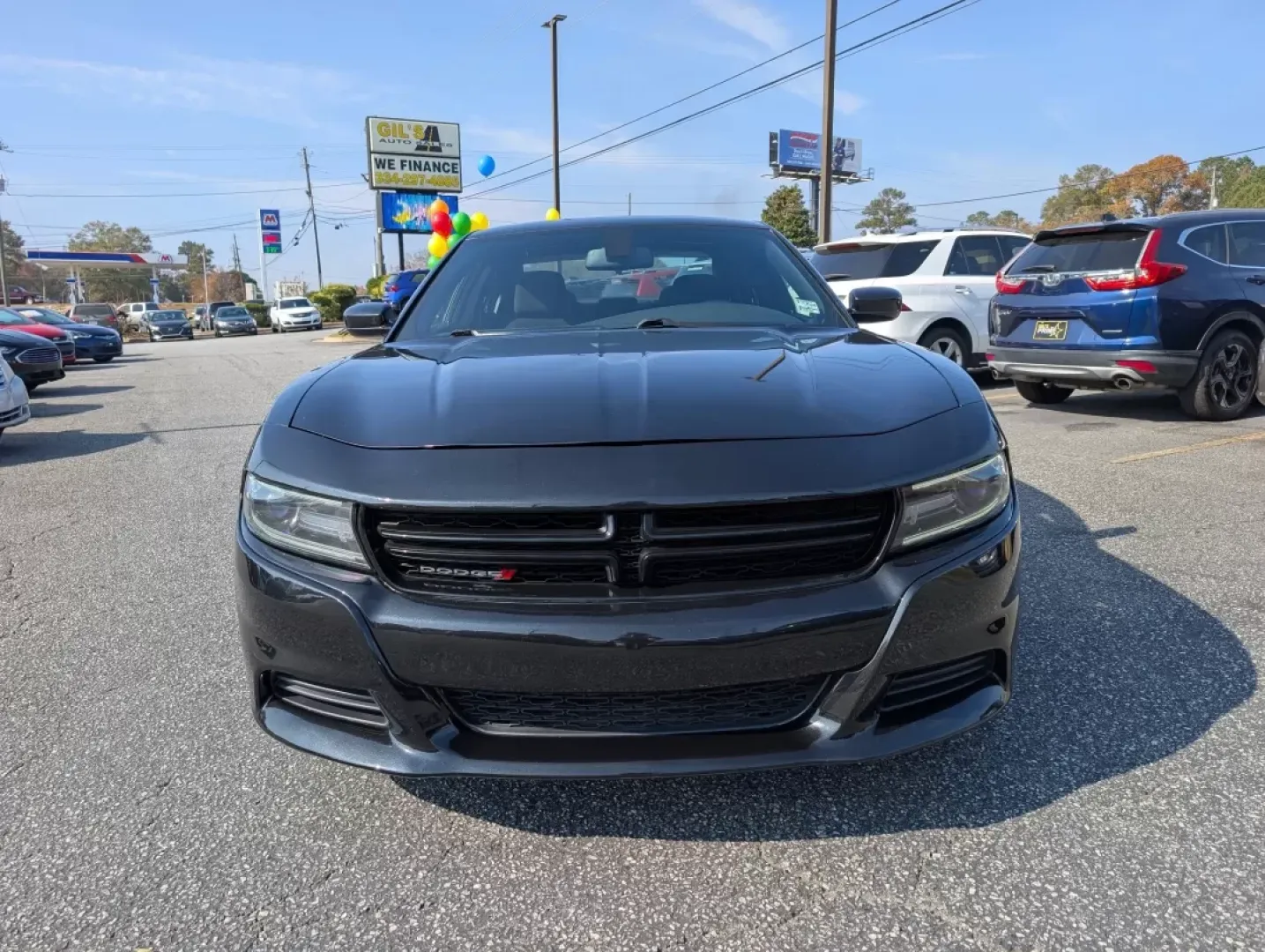 2015 /Black Dodge Charger SE (2C3CDXBG1FH) with an Other engine, located at 3959 U.S. 80 W, Phenix City, AL, 36870, (334) 297-4885, 32.469296, -85.135185 - **Unleash Your Drive with the 2015 Dodge Charger SE - Perfect for Every Journey!**<br /> <br /> Are you looking for a vehicle that makes every drive an adventure? Look no further than this striking 2015 Dodge Charger SE, available now at Gils Auto in Phenix City, AL! Whether you're commuting to work - Photo#1