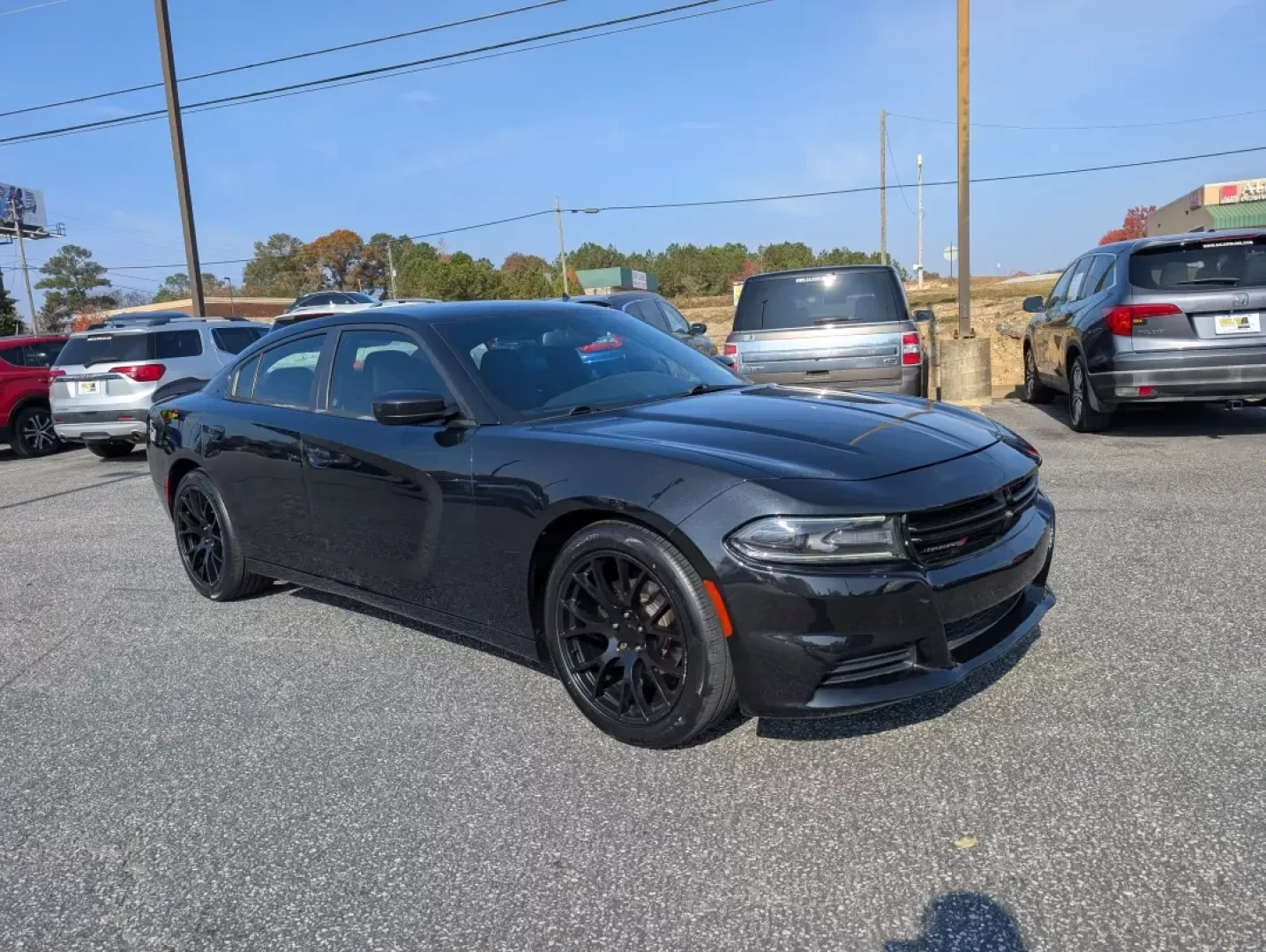 2015 /Black Dodge Charger SE (2C3CDXBG1FH) with an Other engine, located at 3959 U.S. 80 W, Phenix City, AL, 36870, (334) 297-4885, 32.469296, -85.135185 - **Unleash Your Drive with the 2015 Dodge Charger SE - Perfect for Every Journey!**<br /> <br /> Are you looking for a vehicle that makes every drive an adventure? Look no further than this striking 2015 Dodge Charger SE, available now at Gils Auto in Phenix City, AL! Whether you're commuting to work - Photo#2