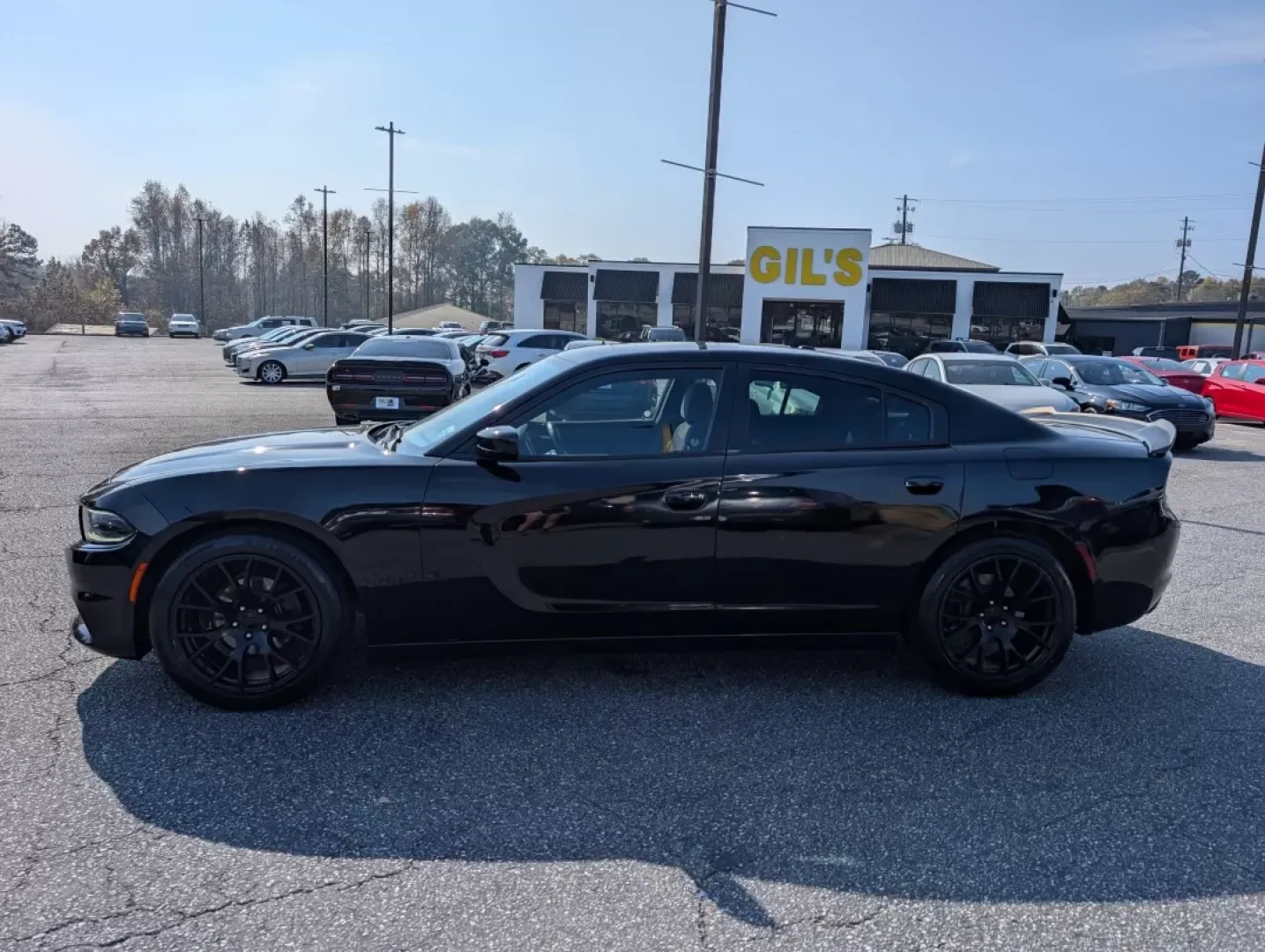 2015 /Black Dodge Charger SE (2C3CDXBG1FH) with an Other engine, located at 3959 U.S. 80 W, Phenix City, AL, 36870, (334) 297-4885, 32.469296, -85.135185 - **Unleash Your Drive with the 2015 Dodge Charger SE - Perfect for Every Journey!**<br /> <br /> Are you looking for a vehicle that makes every drive an adventure? Look no further than this striking 2015 Dodge Charger SE, available now at Gils Auto in Phenix City, AL! Whether you're commuting to work - Photo#7