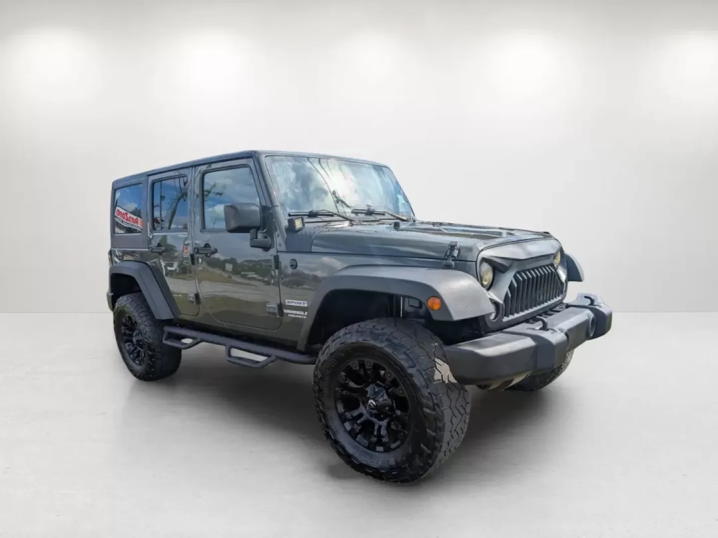 2015 /Black Jeep Wrangler Sport (1C4BJWDG4FL) with an Other engine, located at 1430 Gateway Drive, Opelika, AL, 36801, (334) 239-0944, 32.637871, -85.409790 - **Adventure Awaits with the 2015 Jeep Wrangler at Gils Auto - Phenix City!**<br /> <br /> Are you ready to take on the great outdoors, cruise through city streets, or embark on a family road trip? The 2015 Jeep Wrangler Sport is your ultimate companion for adventure, designed to handle any terrain w - Photo#3
