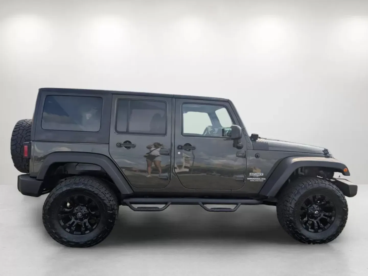 2015 /Black Jeep Wrangler Sport (1C4BJWDG4FL) with an Other engine, located at 1430 Gateway Drive, Opelika, AL, 36801, (334) 239-0944, 32.637871, -85.409790 - **Adventure Awaits with the 2015 Jeep Wrangler at Gils Auto - Phenix City!**<br /> <br /> Are you ready to take on the great outdoors, cruise through city streets, or embark on a family road trip? The 2015 Jeep Wrangler Sport is your ultimate companion for adventure, designed to handle any terrain w - Photo#4
