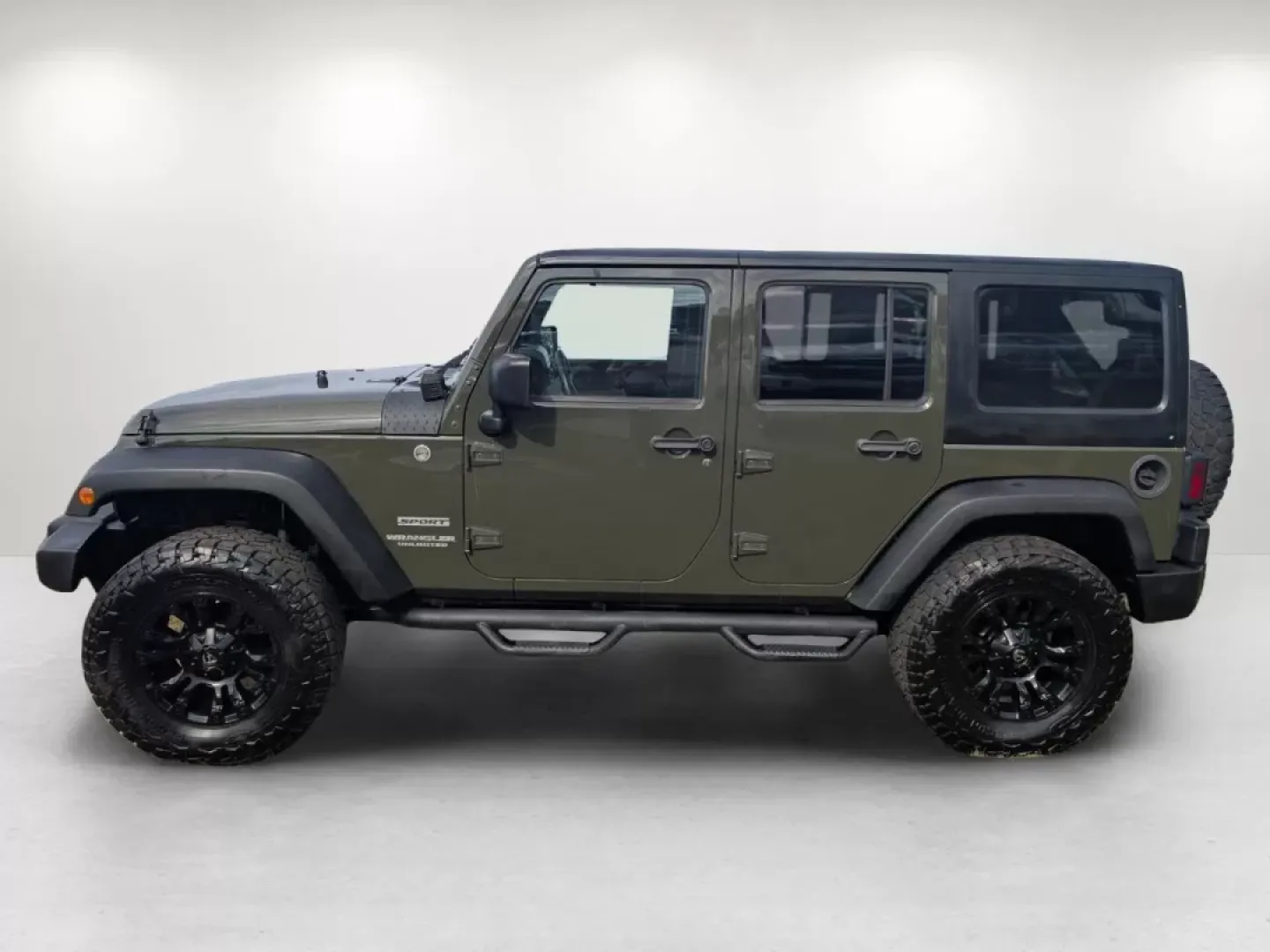 2015 /Black Jeep Wrangler Sport (1C4BJWDG4FL) with an Other engine, located at 1430 Gateway Drive, Opelika, AL, 36801, (334) 239-0944, 32.637871, -85.409790 - **Adventure Awaits with the 2015 Jeep Wrangler at Gils Auto - Phenix City!**<br /> <br /> Are you ready to take on the great outdoors, cruise through city streets, or embark on a family road trip? The 2015 Jeep Wrangler Sport is your ultimate companion for adventure, designed to handle any terrain w - Photo#8
