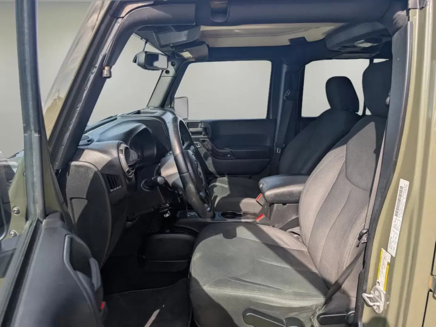 2015 /Black Jeep Wrangler Sport (1C4BJWDG4FL) with an Other engine, located at 1430 Gateway Drive, Opelika, AL, 36801, (334) 239-0944, 32.637871, -85.409790 - **Adventure Awaits with the 2015 Jeep Wrangler at Gils Auto - Phenix City!**<br /> <br /> Are you ready to take on the great outdoors, cruise through city streets, or embark on a family road trip? The 2015 Jeep Wrangler Sport is your ultimate companion for adventure, designed to handle any terrain w - Photo#10