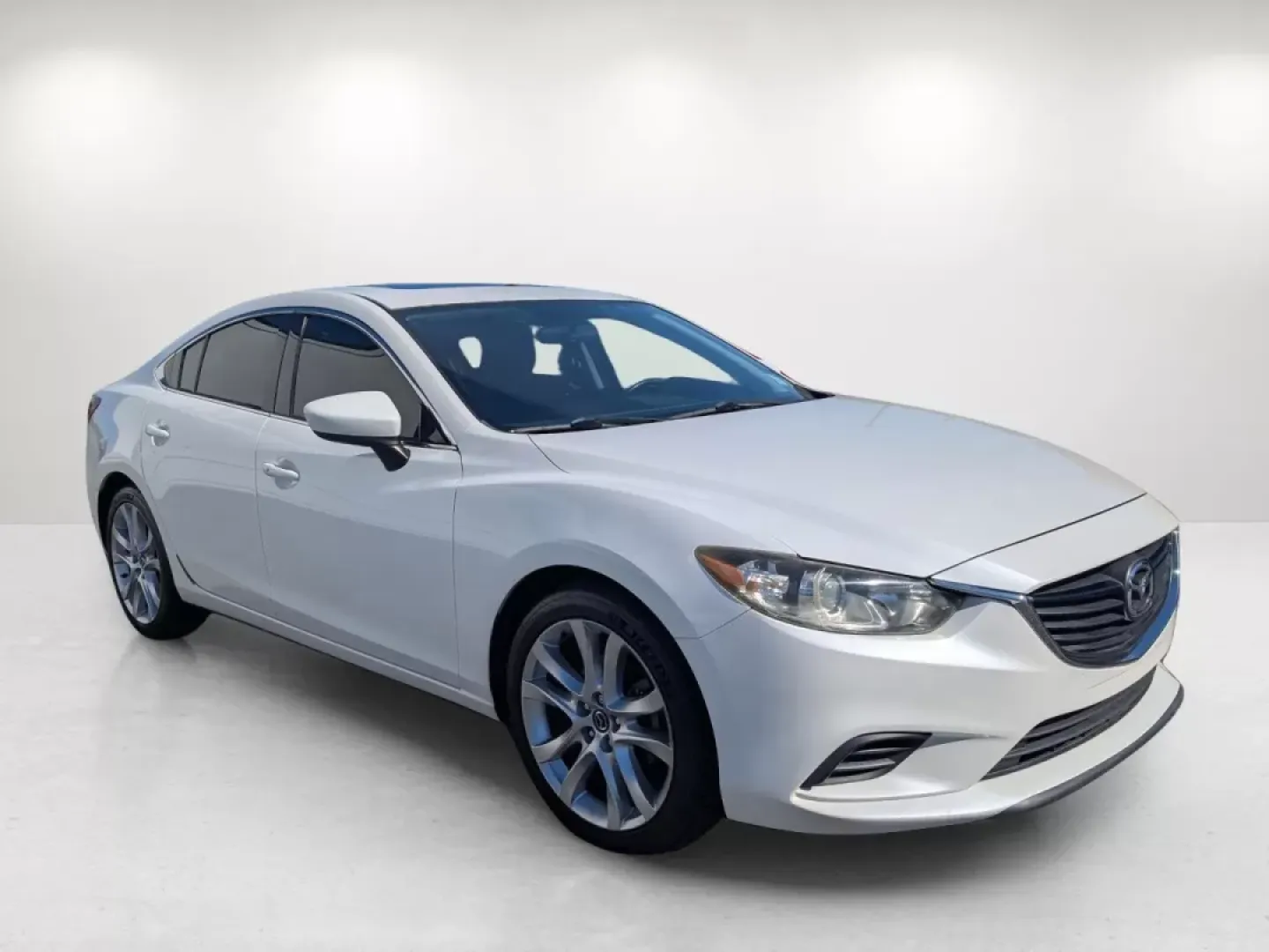 2015 /Black Mazda Mazda6 i Touring (JM1GJ1V63F1) with an Other engine, located at 1430 Gateway Drive, Opelika, AL, 36801, (334) 239-0944, 32.637871, -85.409790 - Experience the perfect blend of style, comfort, and performance with this stunning 2015 Mazda6 i Touring, available now at Gils Auto in Phenix City, AL. If you're seeking a reliable and sophisticated vehicle that fits seamlessly into your busy lifestyle-whether it's for your daily commute, family ou - Photo#2