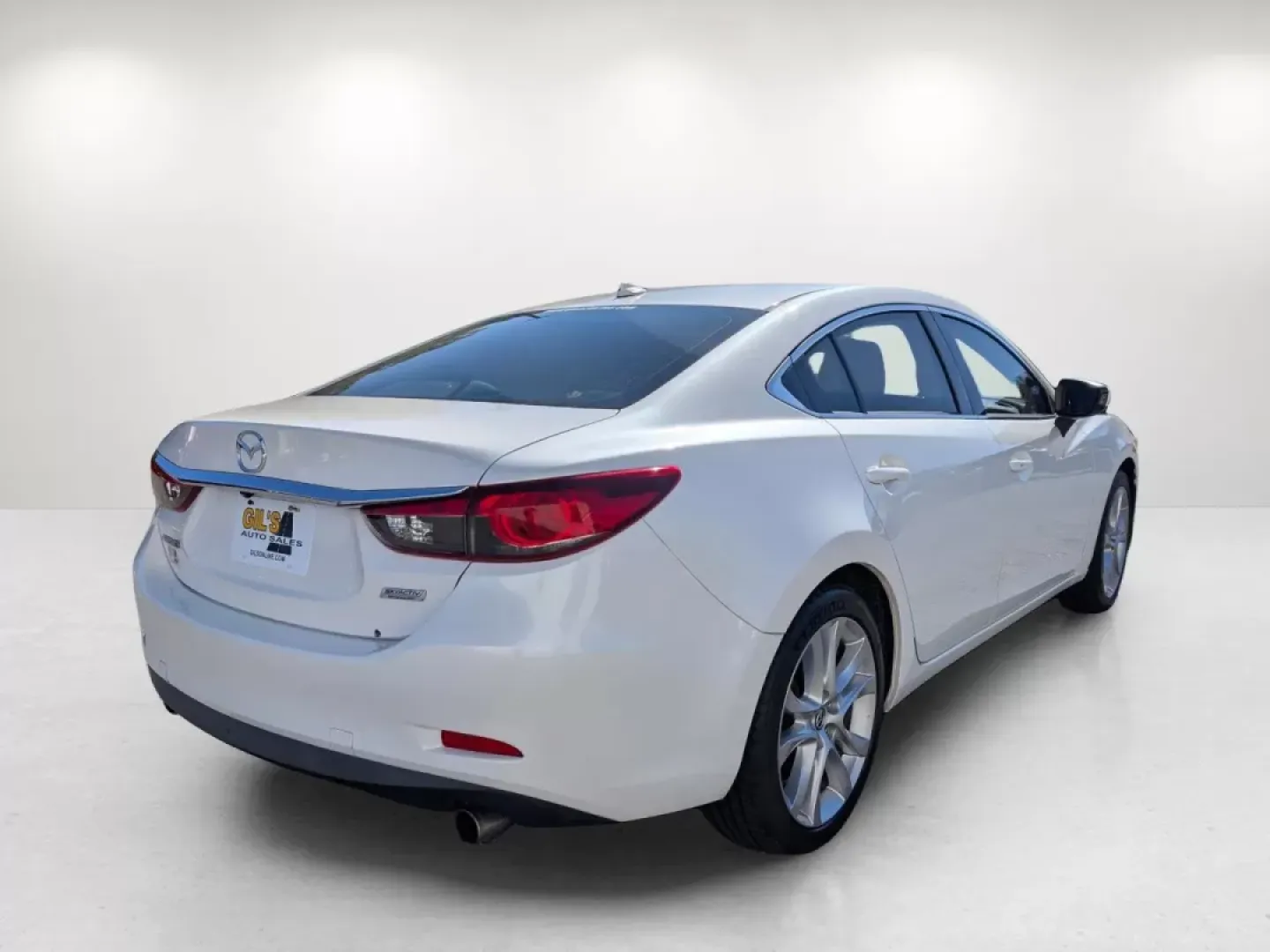 2015 /Black Mazda Mazda6 i Touring (JM1GJ1V63F1) with an Other engine, located at 1430 Gateway Drive, Opelika, AL, 36801, (334) 239-0944, 32.637871, -85.409790 - Experience the perfect blend of style, comfort, and performance with this stunning 2015 Mazda6 i Touring, available now at Gils Auto in Phenix City, AL. If you're seeking a reliable and sophisticated vehicle that fits seamlessly into your busy lifestyle-whether it's for your daily commute, family ou - Photo#4