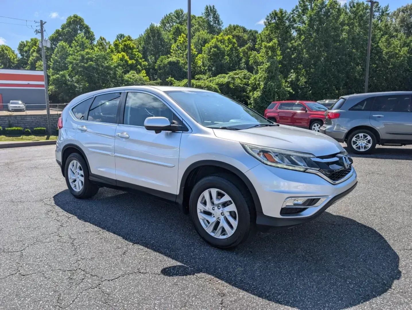 2016 Silver Honda CR-V EX (2HKRM4H54GH) with an Regular Unleaded I-4 2.4 L/144 engine, 1-Speed CVT w/OD transmission, located at 3959 U.S. 80 W, Phenix City, AL, 36870, (334) 297-4885, 32.469296, -85.135185 - **Discover Your Perfect Adventure Companion: 2016 Honda CR-V EX AWD at Gils Auto Phenix City!**<br /> <br /> Are you ready to elevate your road trips and everyday adventures? The versatile and reliable 2016 Honda CR-V EX AWD is here to meet all your lifestyle needs! Whether you're a busy parent in - Photo#2