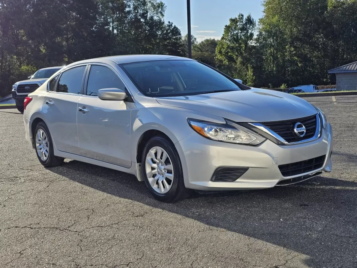 2016 /Charcoal Nissan Altima 2.5 S (1N4AL3AP3GN) with an Other engine, located at 3959 U.S. 80 W, Phenix City, AL, 36870, (334) 297-4885, 32.469296, -85.135185 - **Discover Your Perfect Daily Driver: 2016 Nissan Altima 2.5 S at Gils Auto - Phenix City**<br /> <br /> Are you searching for a reliable sedan that fits seamlessly into your busy lifestyle? Look no further than this stunning 2016 Nissan Altima 2.5 S at Gils Auto in Phenix City, AL. Ideal for daily - Photo#2