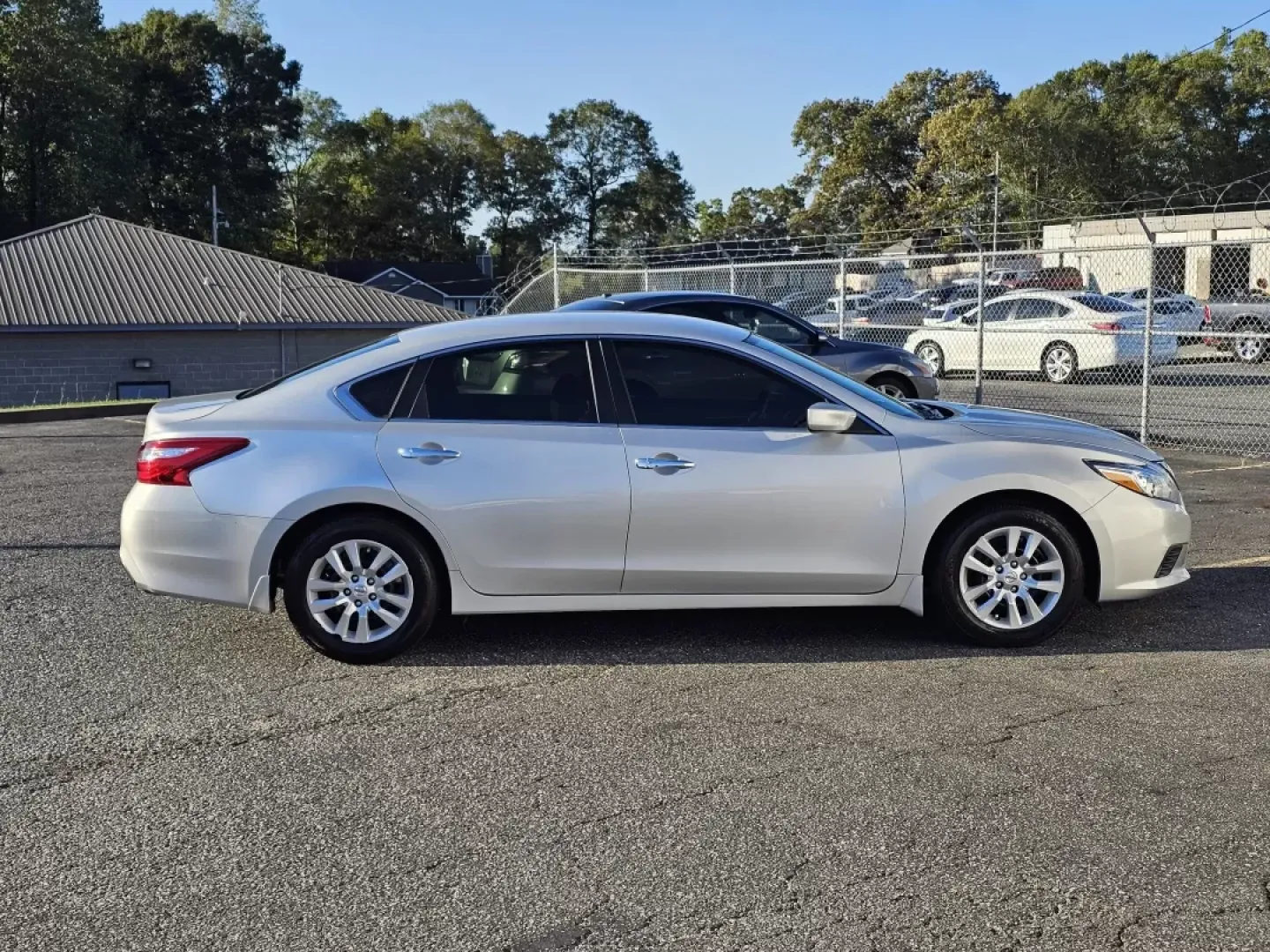 2016 /Charcoal Nissan Altima 2.5 S (1N4AL3AP3GN) with an Other engine, located at 3959 U.S. 80 W, Phenix City, AL, 36870, (334) 297-4885, 32.469296, -85.135185 - **Discover Your Perfect Daily Driver: 2016 Nissan Altima 2.5 S at Gils Auto - Phenix City**<br /> <br /> Are you searching for a reliable sedan that fits seamlessly into your busy lifestyle? Look no further than this stunning 2016 Nissan Altima 2.5 S at Gils Auto in Phenix City, AL. Ideal for daily - Photo#3