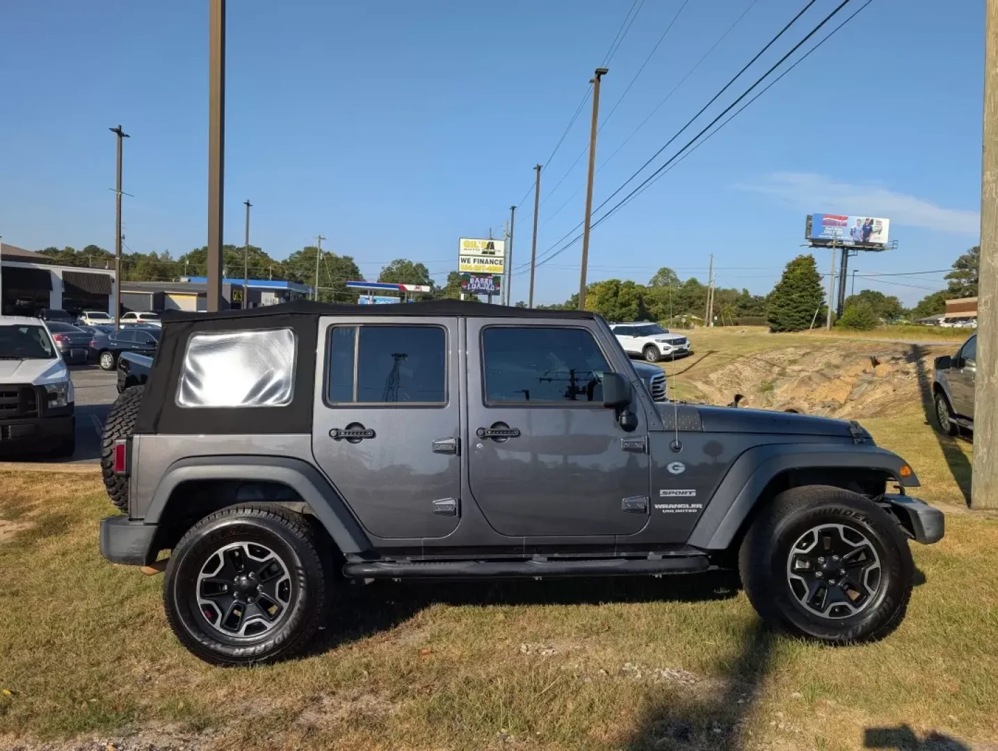2017 /Black Jeep Wrangler Sport (1C4BJWDG5HL) with an Other engine, located at 804 22nd Ave, Phenix City, AL, 36870, (334) 297-1860, 32.484749, -85.024475 - **Adventure Awaits: 2017 Jeep Wrangler Sport in Phenix City, AL**<br /> <br /> Are you ready to take on the open road and explore the great outdoors? The 2017 Jeep Wrangler Sport is not just a vehicle; it's a lifestyle. Built for adventure, this rugged SUV is perfect for weekend escapades, off-road - Photo#3
