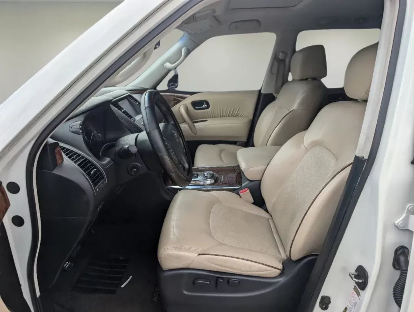 2017 /Almond Nissan Armada Platinum (JN8AY2NC3H9) with an Other engine, located at 1430 Gateway Drive, Opelika, AL, 36801, (334) 239-0944, 32.637871, -85.409790 - ### Experience the Luxury of Adventure with the 2017 Nissan Armada Platinum<br /> <br /> Are you ready to elevate your family adventures or weekend getaways? The 2017 Nissan Armada Platinum is here to deliver an unparalleled driving experience for you and your loved ones. With its spacious interior, - Photo#10