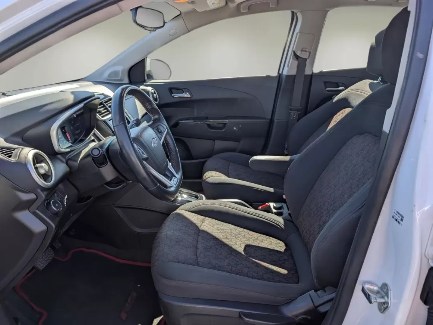 2018 /Jet Black Chevrolet Sonic LT (1G1JD5SHXJ4) with an Other engine, located at 804 22nd Ave, Phenix City, AL, 36870, (334) 297-1860, 32.484749, -85.024475 - **Discover Your Perfect Commute Companion: 2018 Chevrolet Sonic LT at Gils Auto, Phenix City**<br /> <br /> Are you ready to elevate your daily drive? The 2018 Chevrolet Sonic LT is the ideal choice for those who crave a reliable, fuel-efficient sedan that doesn't compromise on style or features. Wh - Photo#9