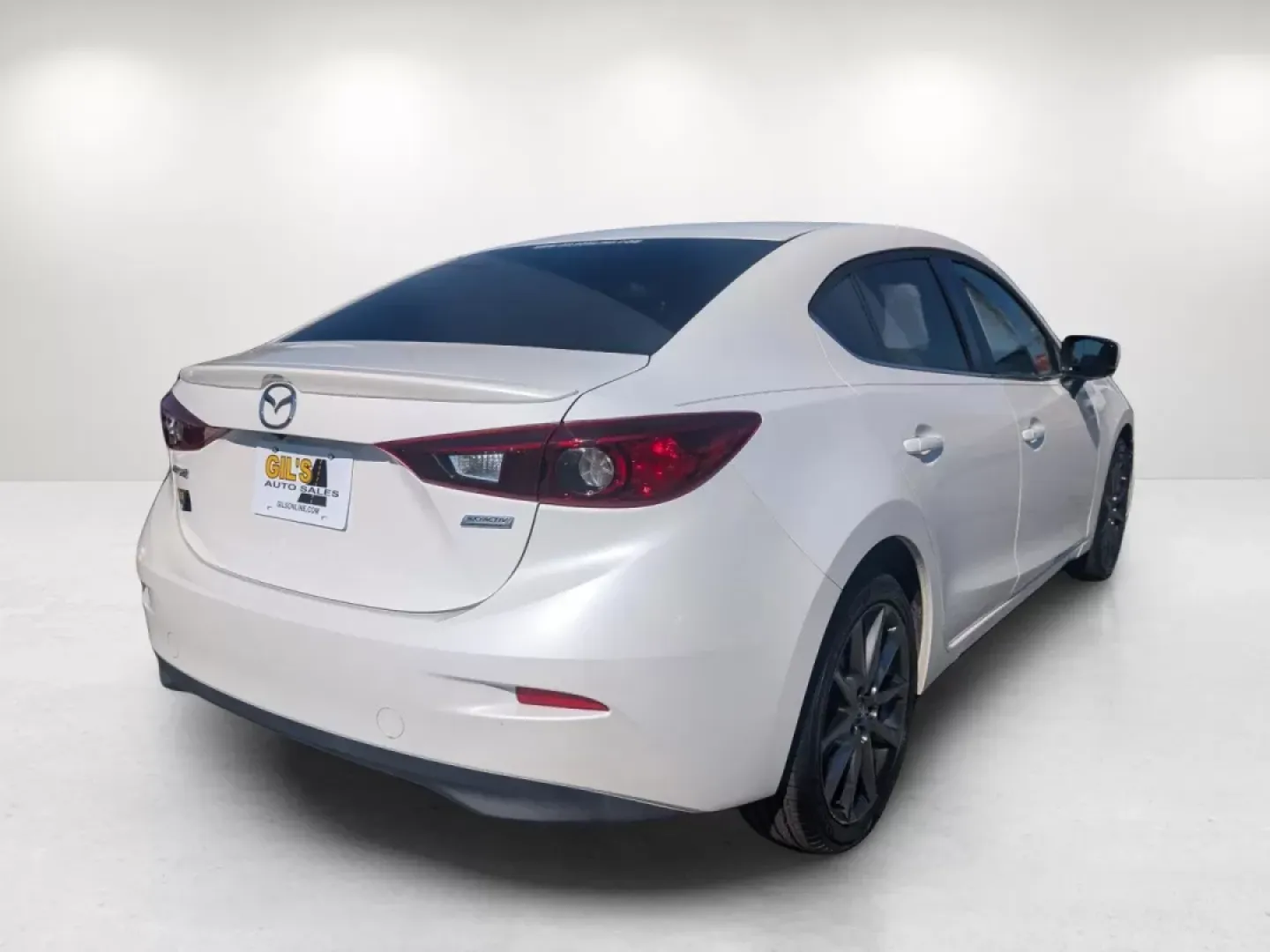 2018 /Black Mazda Mazda3 4-Door Touring (3MZBN1V38JM) with an Other engine, located at 3959 U.S. 80 W, Phenix City, AL, 36870, (334) 297-4885, 32.469296, -85.135185 - Are you ready to elevate your daily commute or make unforgettable road trip memories? The 2018 Mazda3 4-Door Touring at Gils Auto in Phenix City, AL, is your perfect companion. This stylish sedan is designed for both practicality and comfort, making it an excellent choice for budget-conscious buyers - Photo#5