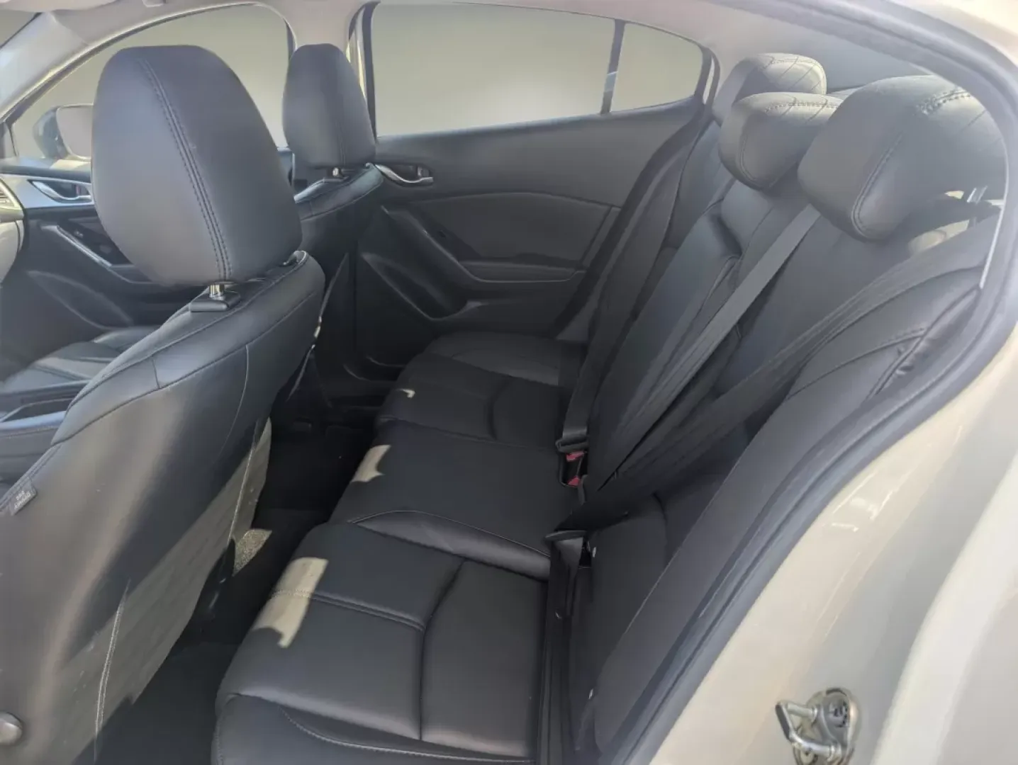 2018 /Black Mazda Mazda3 4-Door Touring (3MZBN1V38JM) with an Other engine, located at 3959 U.S. 80 W, Phenix City, AL, 36870, (334) 297-4885, 32.469296, -85.135185 - Are you ready to elevate your daily commute or make unforgettable road trip memories? The 2018 Mazda3 4-Door Touring at Gils Auto in Phenix City, AL, is your perfect companion. This stylish sedan is designed for both practicality and comfort, making it an excellent choice for budget-conscious buyers - Photo#11