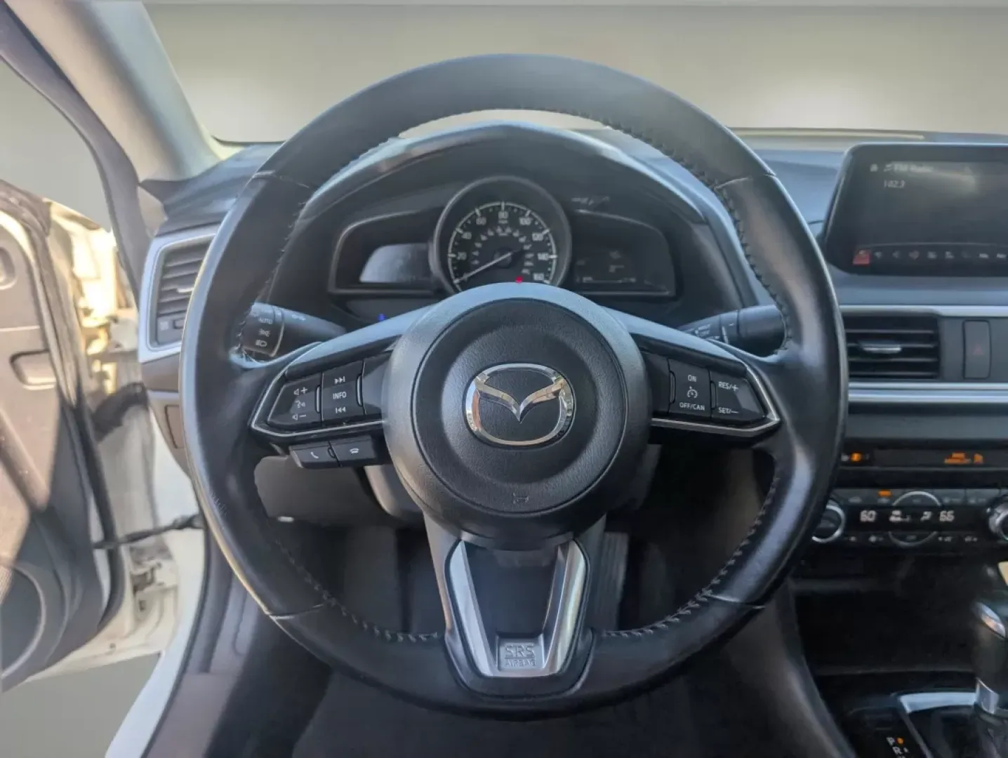 2018 /Black Mazda Mazda3 4-Door Touring (3MZBN1V38JM) with an Other engine, located at 3959 U.S. 80 W, Phenix City, AL, 36870, (334) 297-4885, 32.469296, -85.135185 - Are you ready to elevate your daily commute or make unforgettable road trip memories? The 2018 Mazda3 4-Door Touring at Gils Auto in Phenix City, AL, is your perfect companion. This stylish sedan is designed for both practicality and comfort, making it an excellent choice for budget-conscious buyers - Photo#16