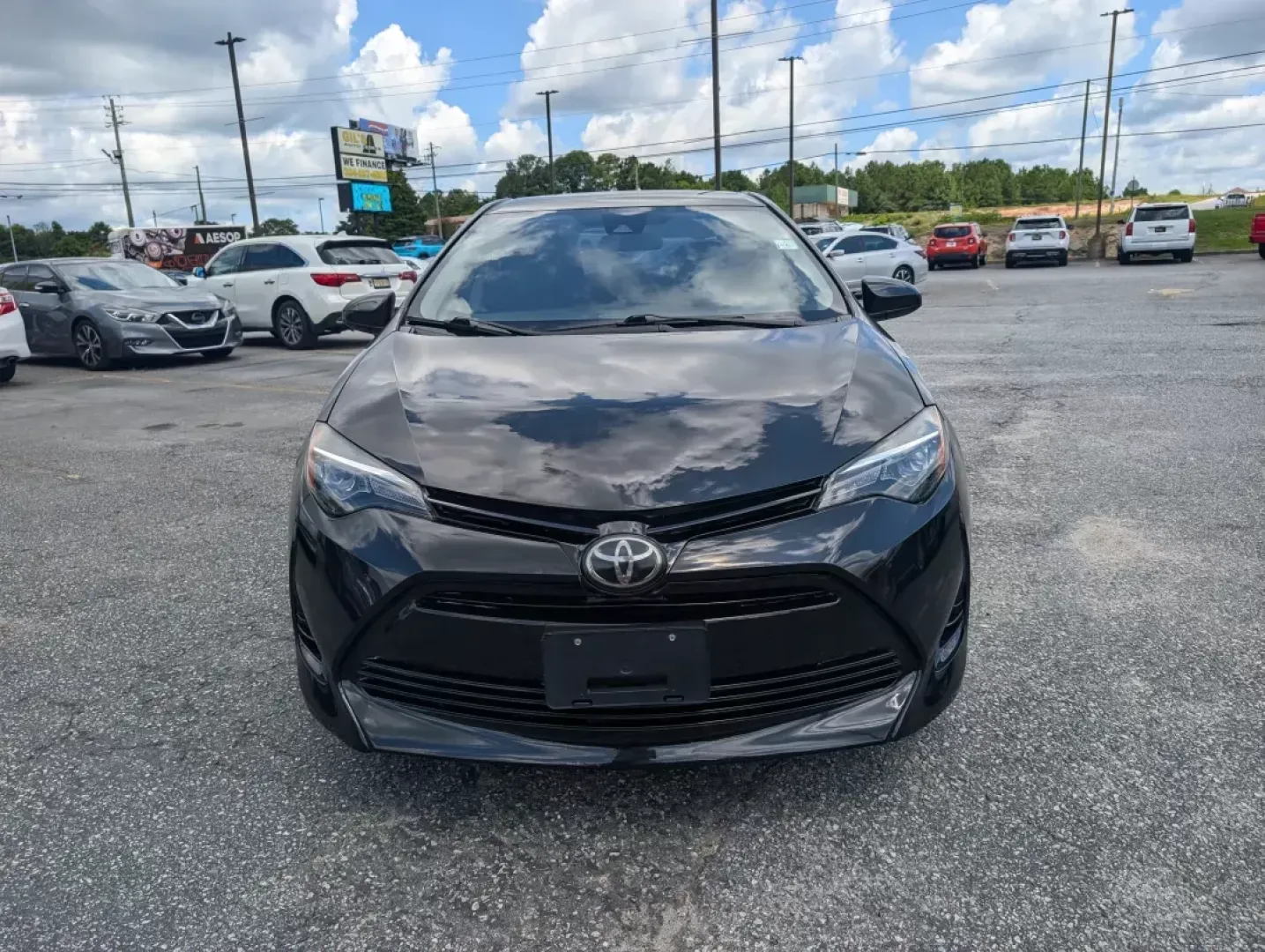 2018 Toyota Corolla LE (5YFBURHE4JP) with an Other engine, located at 3959 U.S. 80 W, Phenix City, AL, 36870, (334) 297-4885, 32.469296, -85.135185 - **Explore the Road with Confidence: 2018 Toyota Corolla at Gils Auto - Phenix City**<br /> <br /> Are you looking for a reliable vehicle that fits seamlessly into your busy lifestyle? Whether you're a commuter tackling long drives to work, a growing family seeking safety and comfort, or an adventure - Photo#1