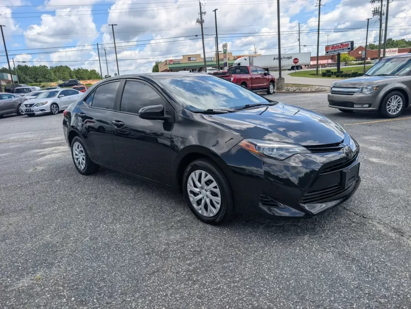 2018 Toyota Corolla LE (5YFBURHE4JP) with an Other engine, located at 3959 U.S. 80 W, Phenix City, AL, 36870, (334) 297-4885, 32.469296, -85.135185 - **Explore the Road with Confidence: 2018 Toyota Corolla at Gils Auto - Phenix City**<br /> <br /> Are you looking for a reliable vehicle that fits seamlessly into your busy lifestyle? Whether you're a commuter tackling long drives to work, a growing family seeking safety and comfort, or an adventure - Photo#2