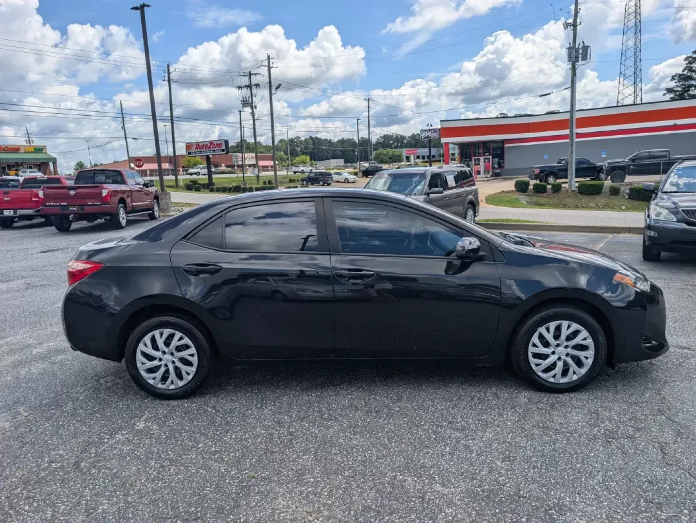 2018 Toyota Corolla LE (5YFBURHE4JP) with an Other engine, located at 3959 U.S. 80 W, Phenix City, AL, 36870, (334) 297-4885, 32.469296, -85.135185 - **Explore the Road with Confidence: 2018 Toyota Corolla at Gils Auto - Phenix City**<br /> <br /> Are you looking for a reliable vehicle that fits seamlessly into your busy lifestyle? Whether you're a commuter tackling long drives to work, a growing family seeking safety and comfort, or an adventure - Photo#3