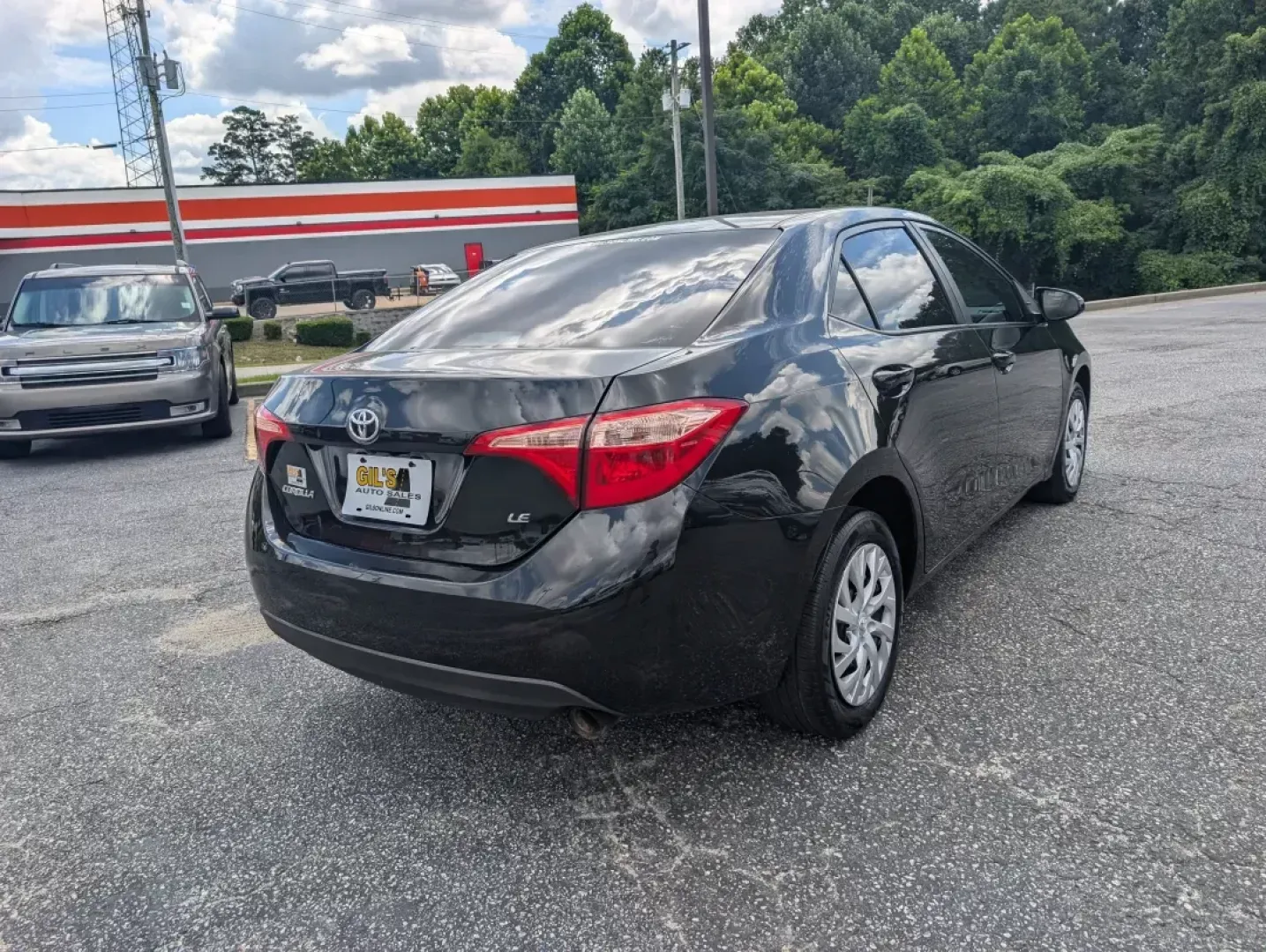 2018 Toyota Corolla LE (5YFBURHE4JP) with an Other engine, located at 3959 U.S. 80 W, Phenix City, AL, 36870, (334) 297-4885, 32.469296, -85.135185 - **Explore the Road with Confidence: 2018 Toyota Corolla at Gils Auto - Phenix City**<br /> <br /> Are you looking for a reliable vehicle that fits seamlessly into your busy lifestyle? Whether you're a commuter tackling long drives to work, a growing family seeking safety and comfort, or an adventure - Photo#4