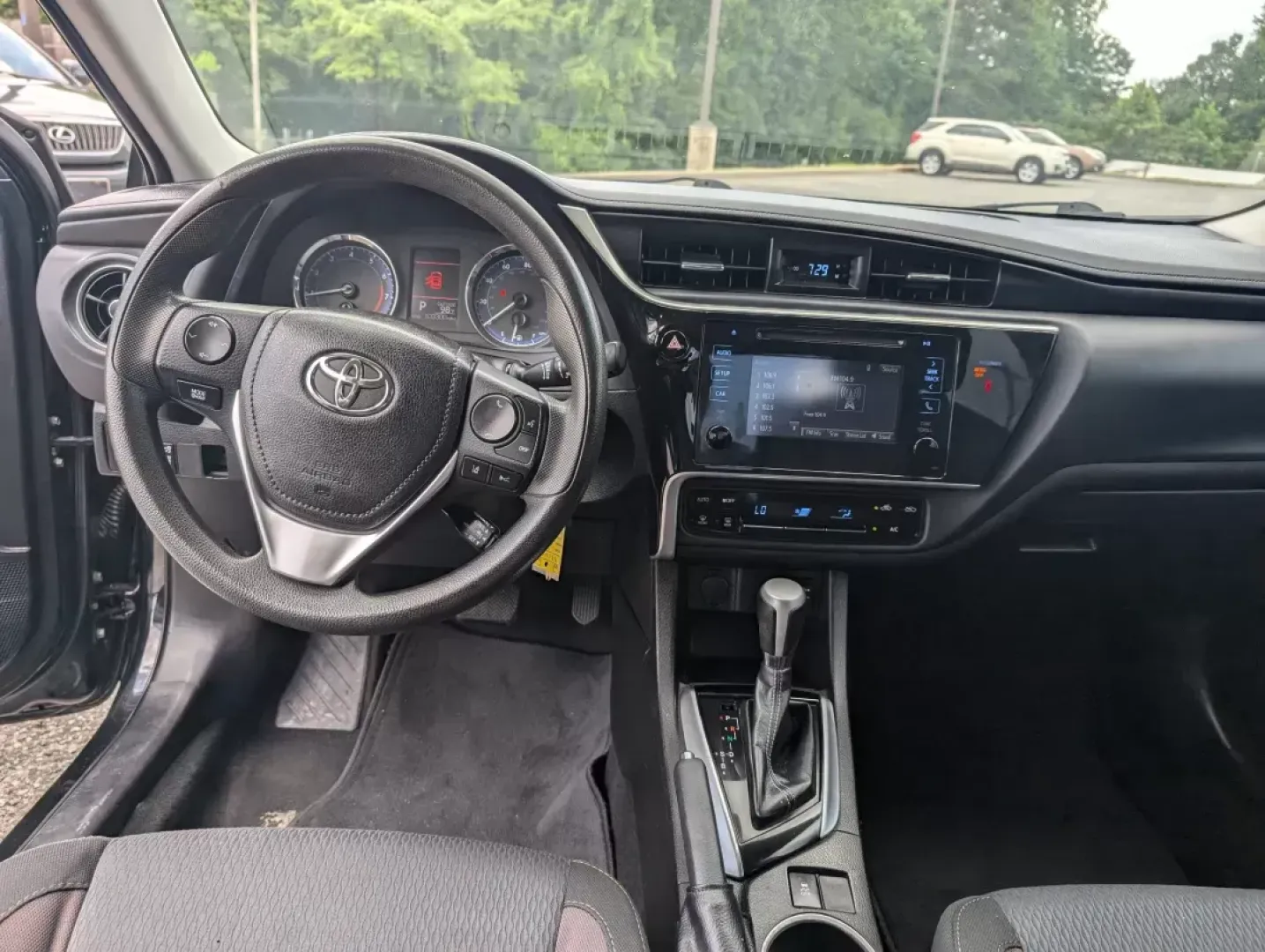 2018 Toyota Corolla LE (5YFBURHE4JP) with an Other engine, located at 3959 U.S. 80 W, Phenix City, AL, 36870, (334) 297-4885, 32.469296, -85.135185 - **Explore the Road with Confidence: 2018 Toyota Corolla at Gils Auto - Phenix City**<br /> <br /> Are you looking for a reliable vehicle that fits seamlessly into your busy lifestyle? Whether you're a commuter tackling long drives to work, a growing family seeking safety and comfort, or an adventure - Photo#11