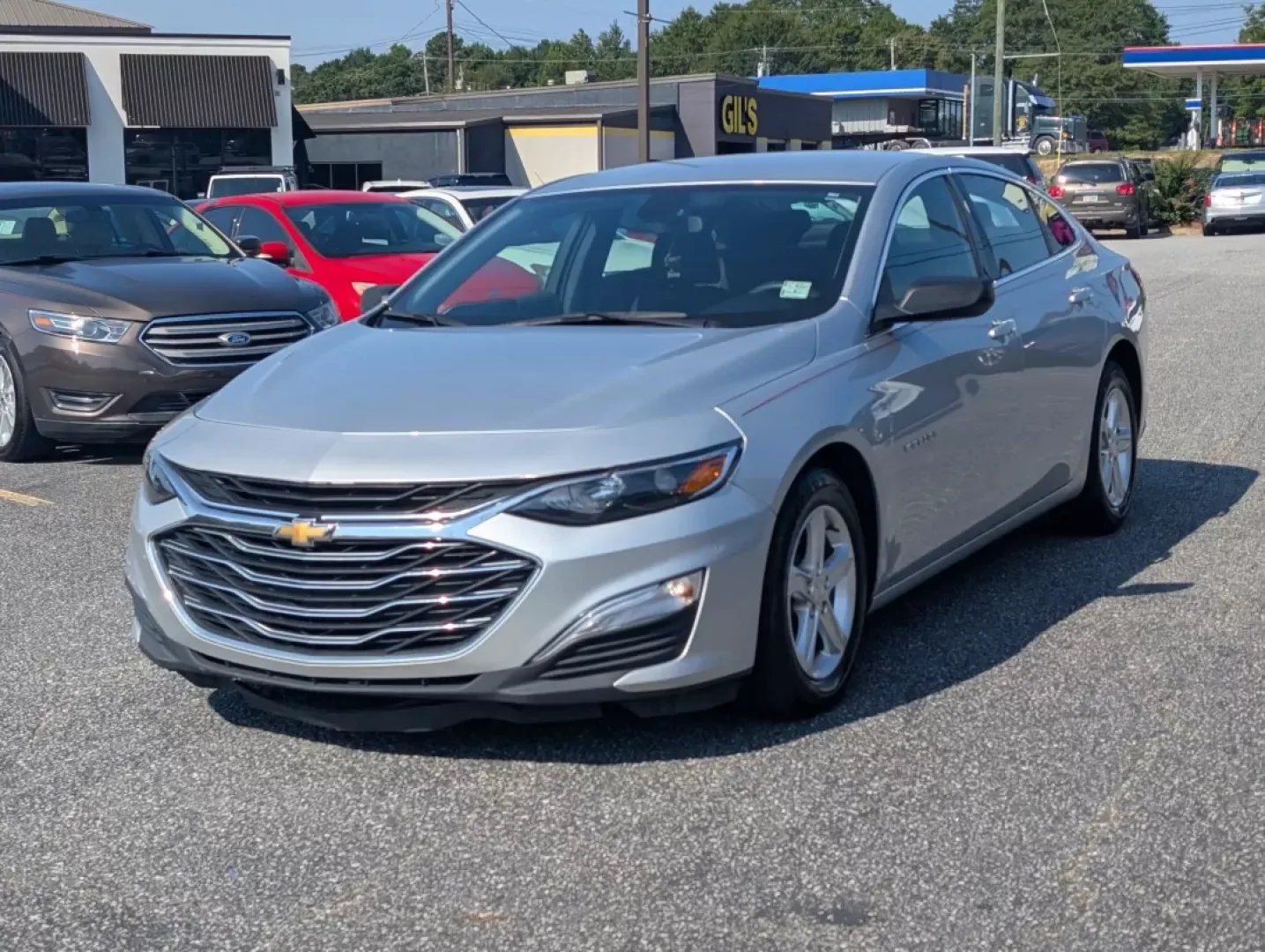 2021 /Jet Black Chevrolet Malibu LS (1G1ZC5ST7MF) with an Other engine, located at 3959 U.S. 80 W, Phenix City, AL, 36870, (334) 297-4885, 32.469296, -85.135185 - **Discover the Perfect Blend of Style and Reliability: 2021 Chevrolet Malibu LS at Gils Auto in Phenix City, AL**<br /> <br /> Are you searching for a reliable sedan that fits seamlessly into your busy lifestyle? Whether you're commuting to work, running errands around Phenix City, or enjoying weeke - Photo#0