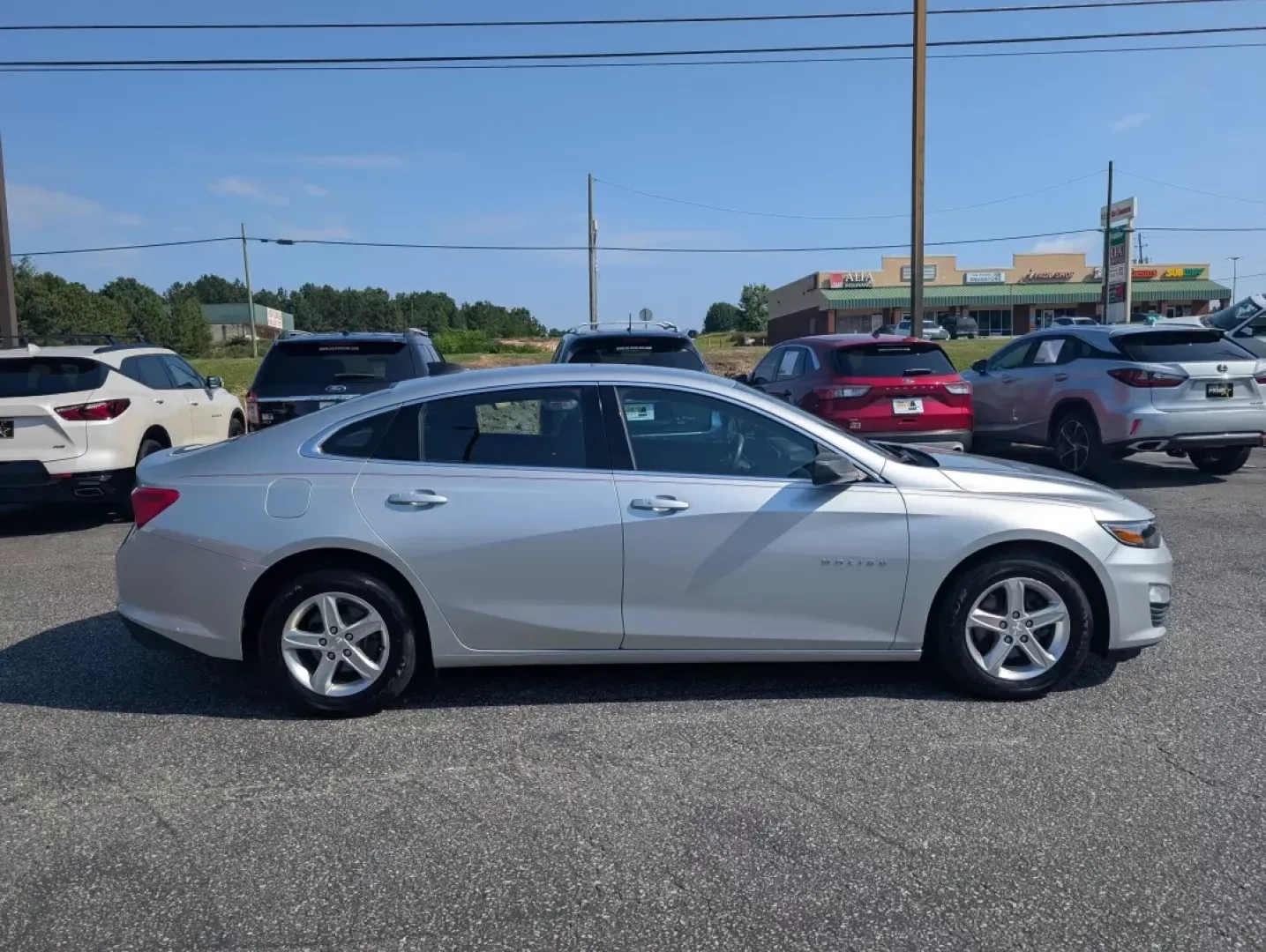 2021 /Jet Black Chevrolet Malibu LS (1G1ZC5ST7MF) with an Other engine, located at 3959 U.S. 80 W, Phenix City, AL, 36870, (334) 297-4885, 32.469296, -85.135185 - **Discover the Perfect Blend of Style and Reliability: 2021 Chevrolet Malibu LS at Gils Auto in Phenix City, AL**<br /> <br /> Are you searching for a reliable sedan that fits seamlessly into your busy lifestyle? Whether you're commuting to work, running errands around Phenix City, or enjoying weeke - Photo#3