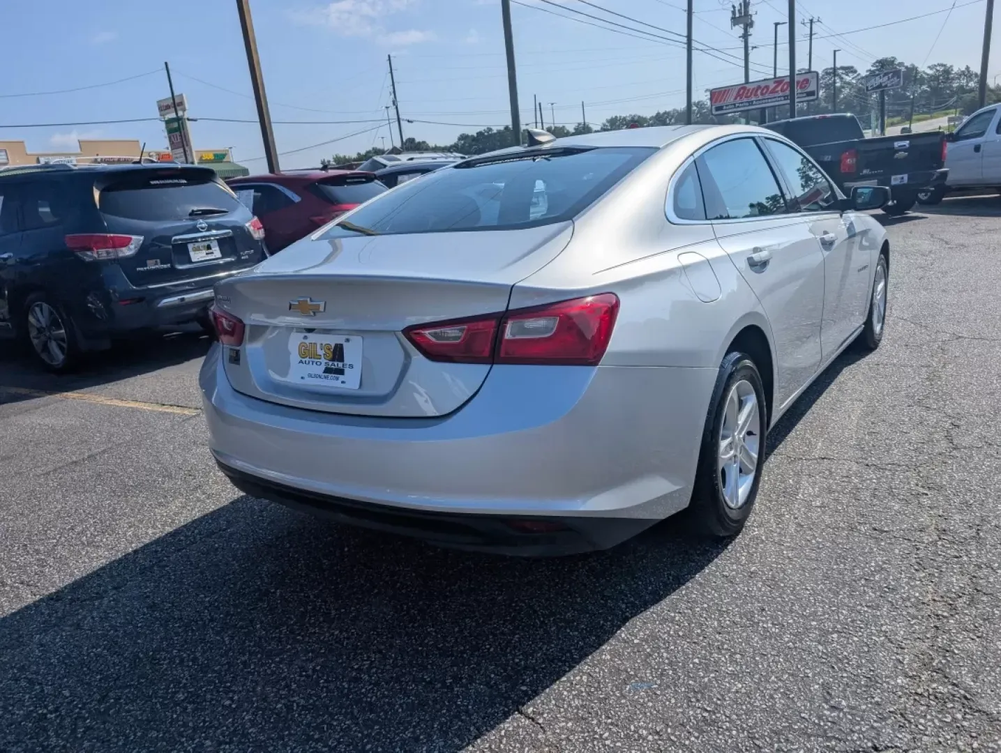 2021 /Jet Black Chevrolet Malibu LS (1G1ZC5ST7MF) with an Other engine, located at 3959 U.S. 80 W, Phenix City, AL, 36870, (334) 297-4885, 32.469296, -85.135185 - **Discover the Perfect Blend of Style and Reliability: 2021 Chevrolet Malibu LS at Gils Auto in Phenix City, AL**<br /> <br /> Are you searching for a reliable sedan that fits seamlessly into your busy lifestyle? Whether you're commuting to work, running errands around Phenix City, or enjoying weeke - Photo#4
